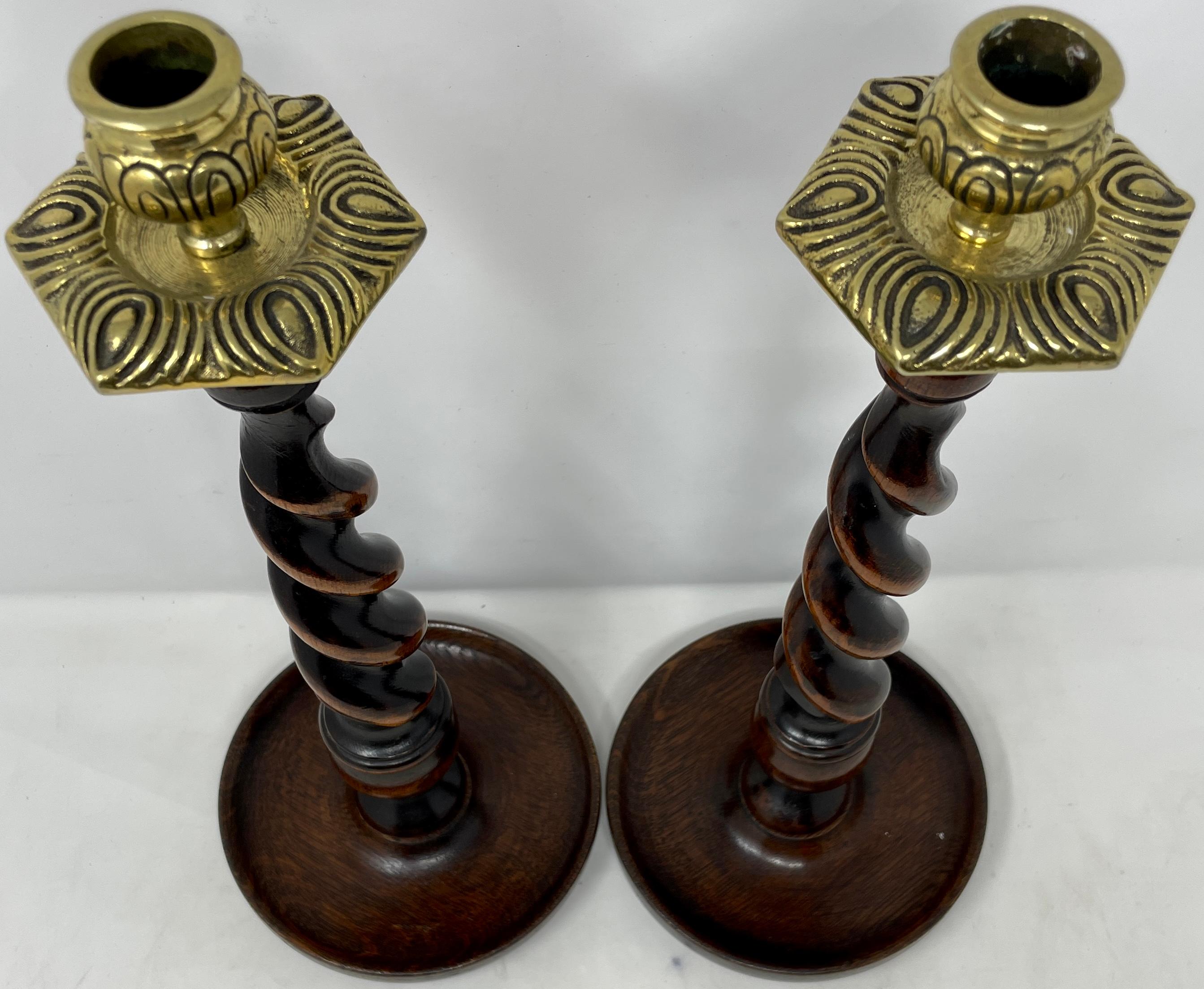 Pair antique English oak barley twist and brass candlesticks, Circa 1890.