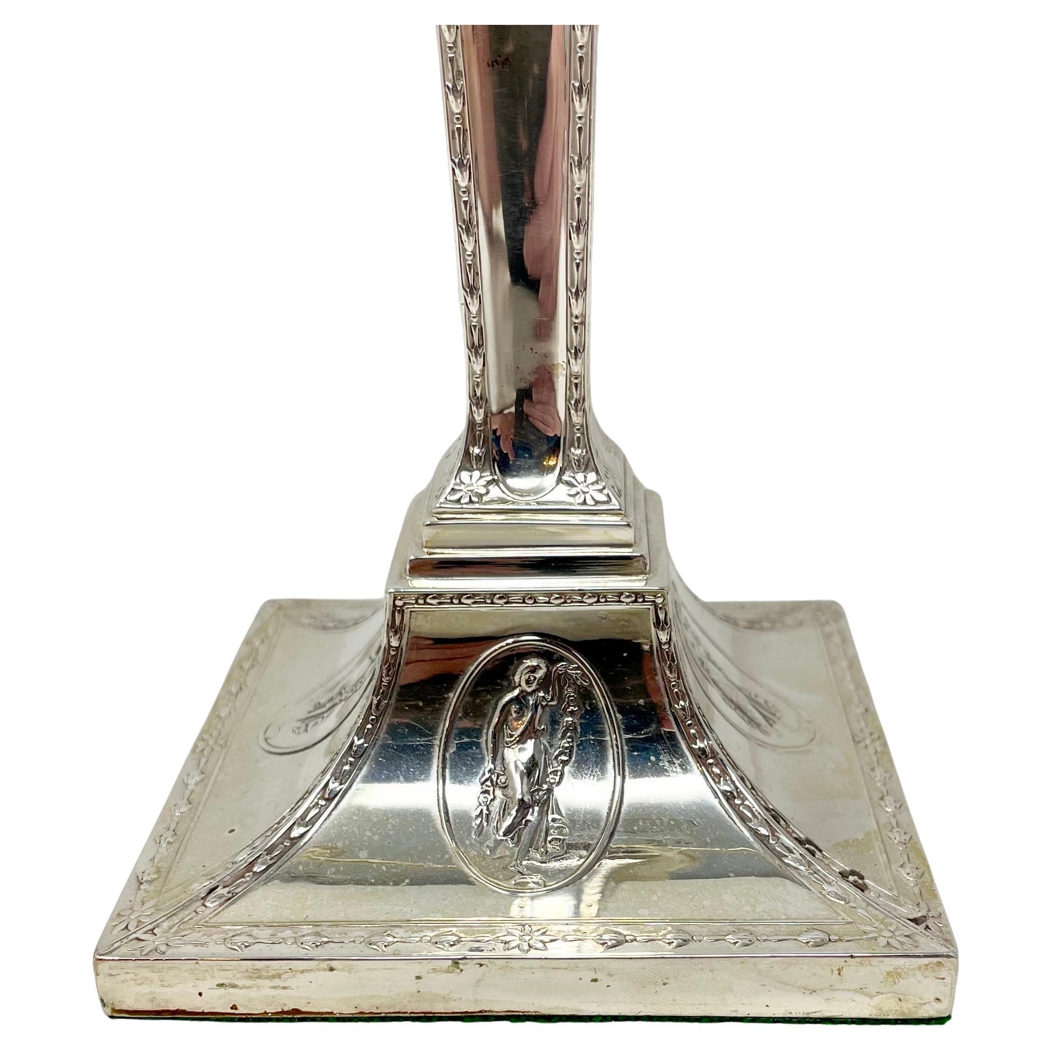 Coppia di antichi candelabri inglesi in argento Sheffield 