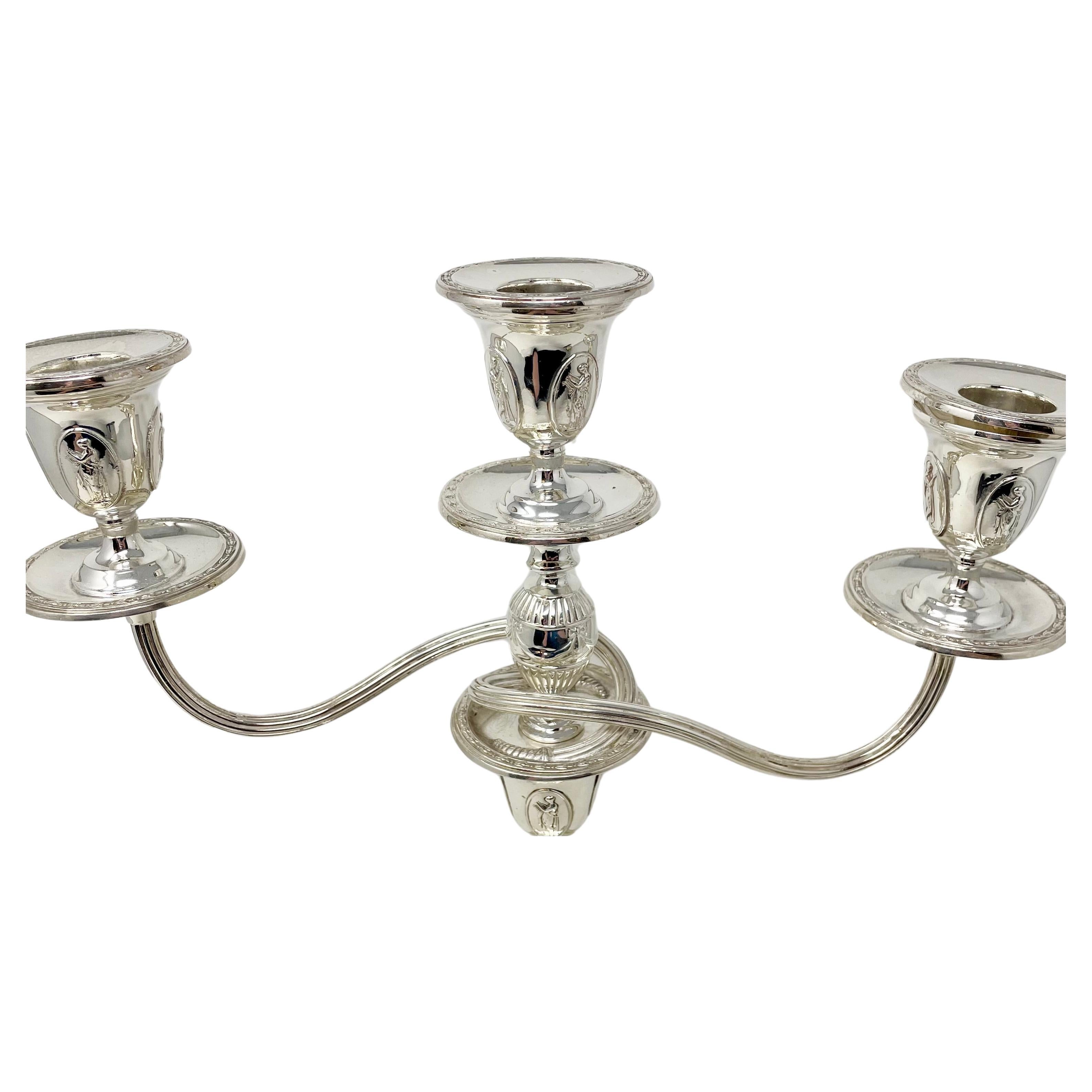 Coppia di antichi candelabri inglesi in argento Sheffield 
