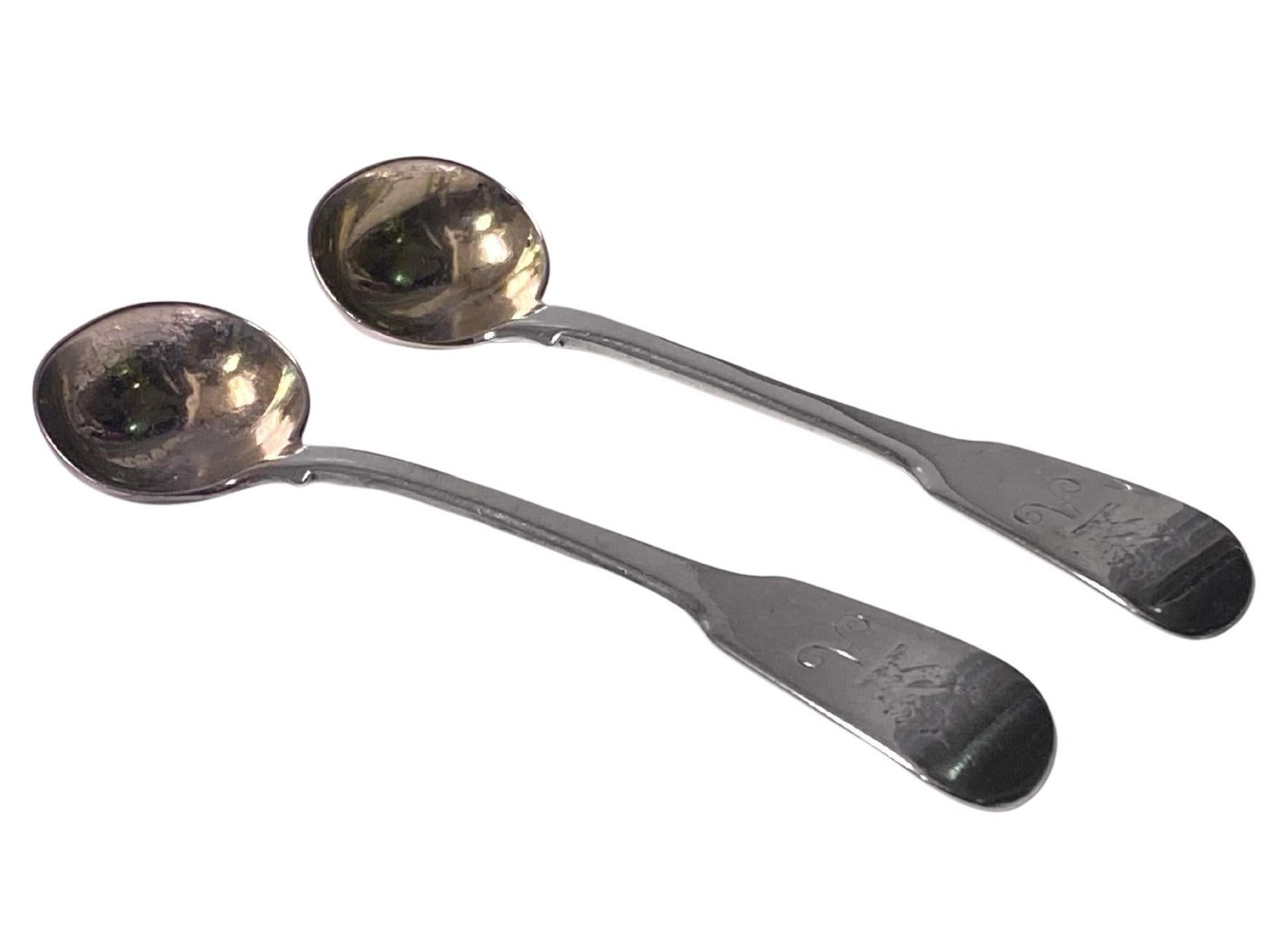 Pair Antique English Silver master Salt Spoons London 1816 Thomas and George Hayter. Fiddle pattern, each engraved with crest of peacock with letter A, gilded bowls. Length: 4.00 inches. Weight: 52.70 grams. Condition: Good. Reflections in bowls