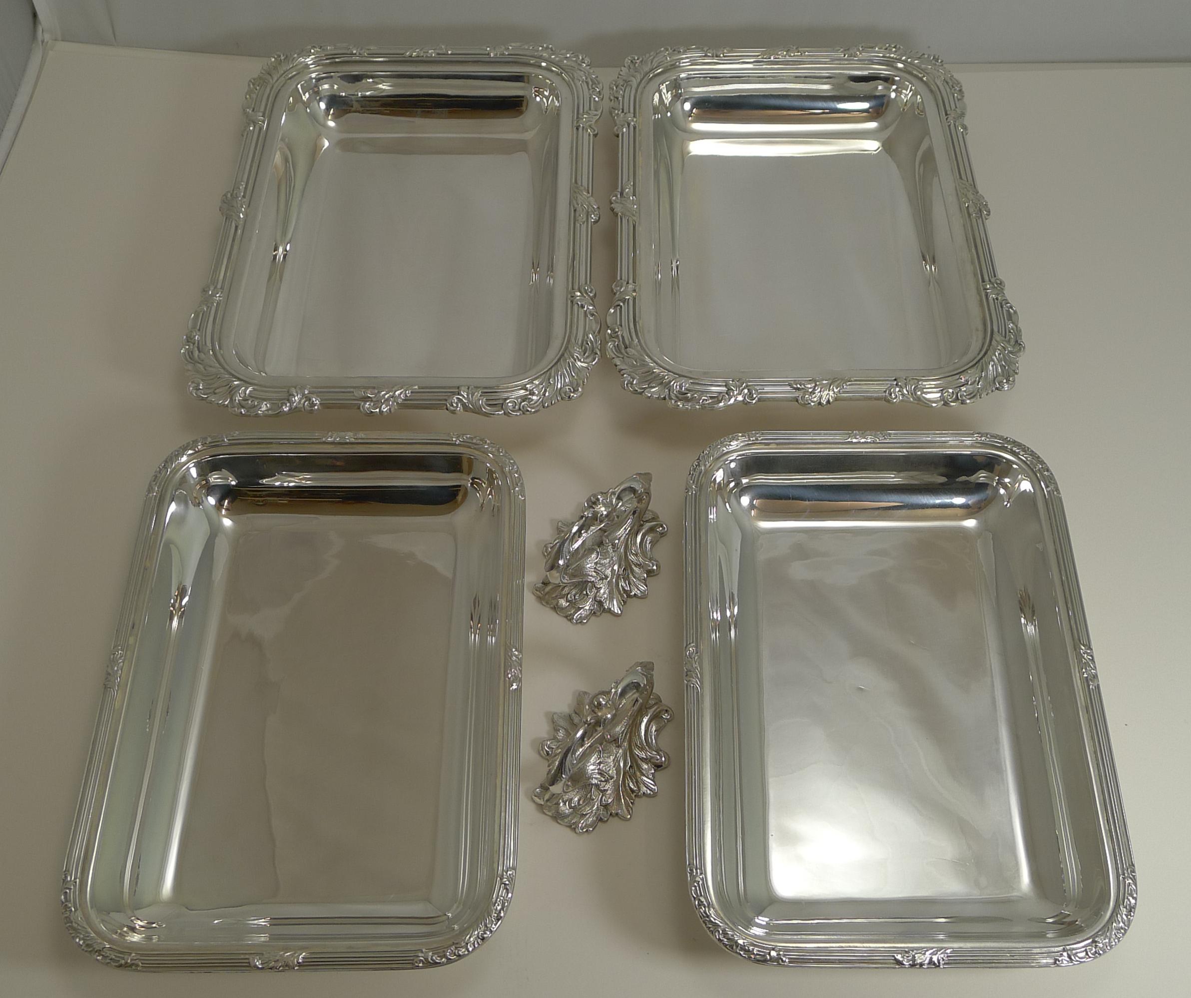 A lovely pair of Victorian entree dishes, made from silver plate by the well renowned silversmith, James Dixon & Sons and dating to the late Victorian era, circa 1890.

The removable handles allow for easy storage and also the lids to be turned