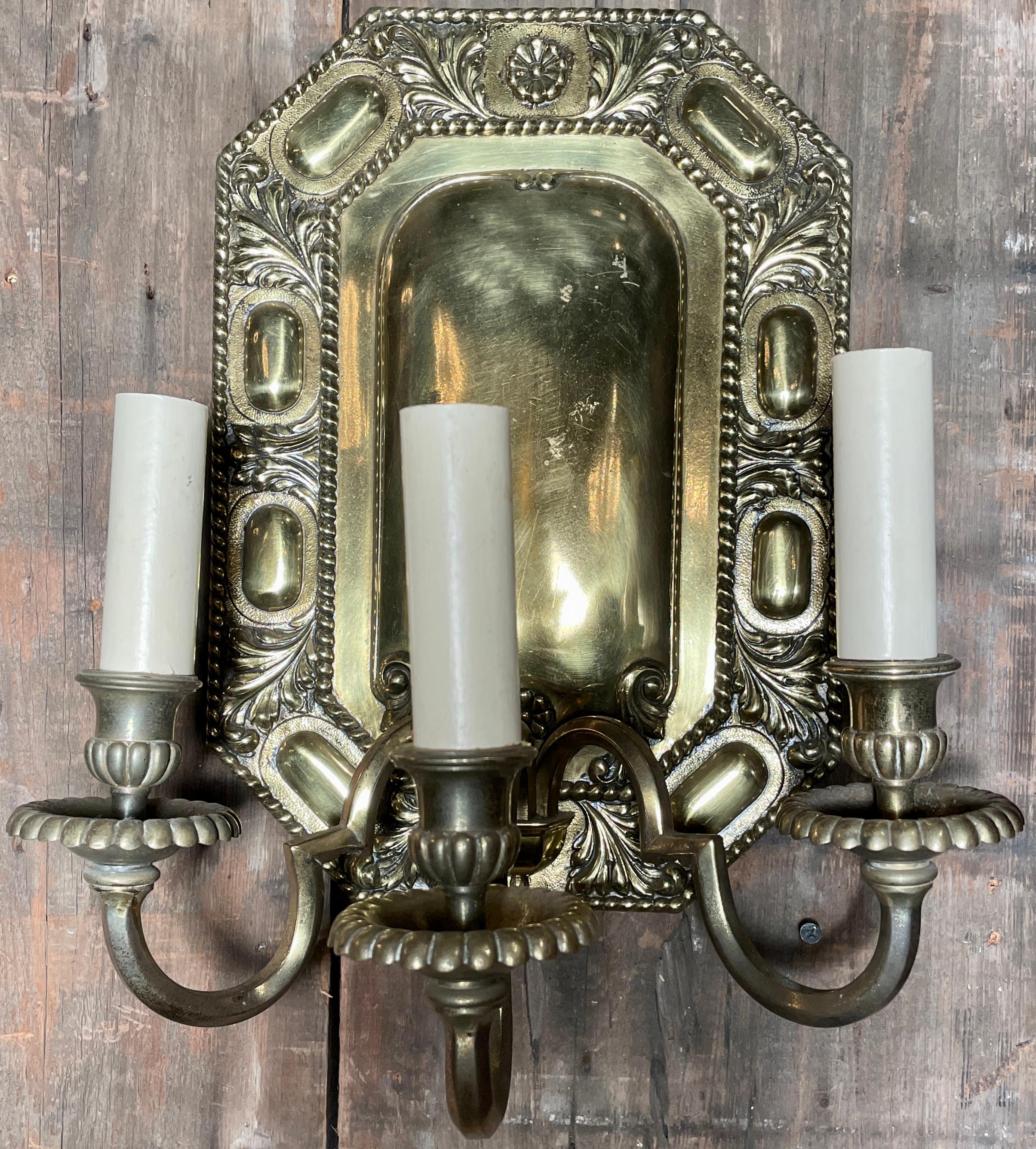 Pair antique English solid brass 3 - light wall sconces, Circa 1910.