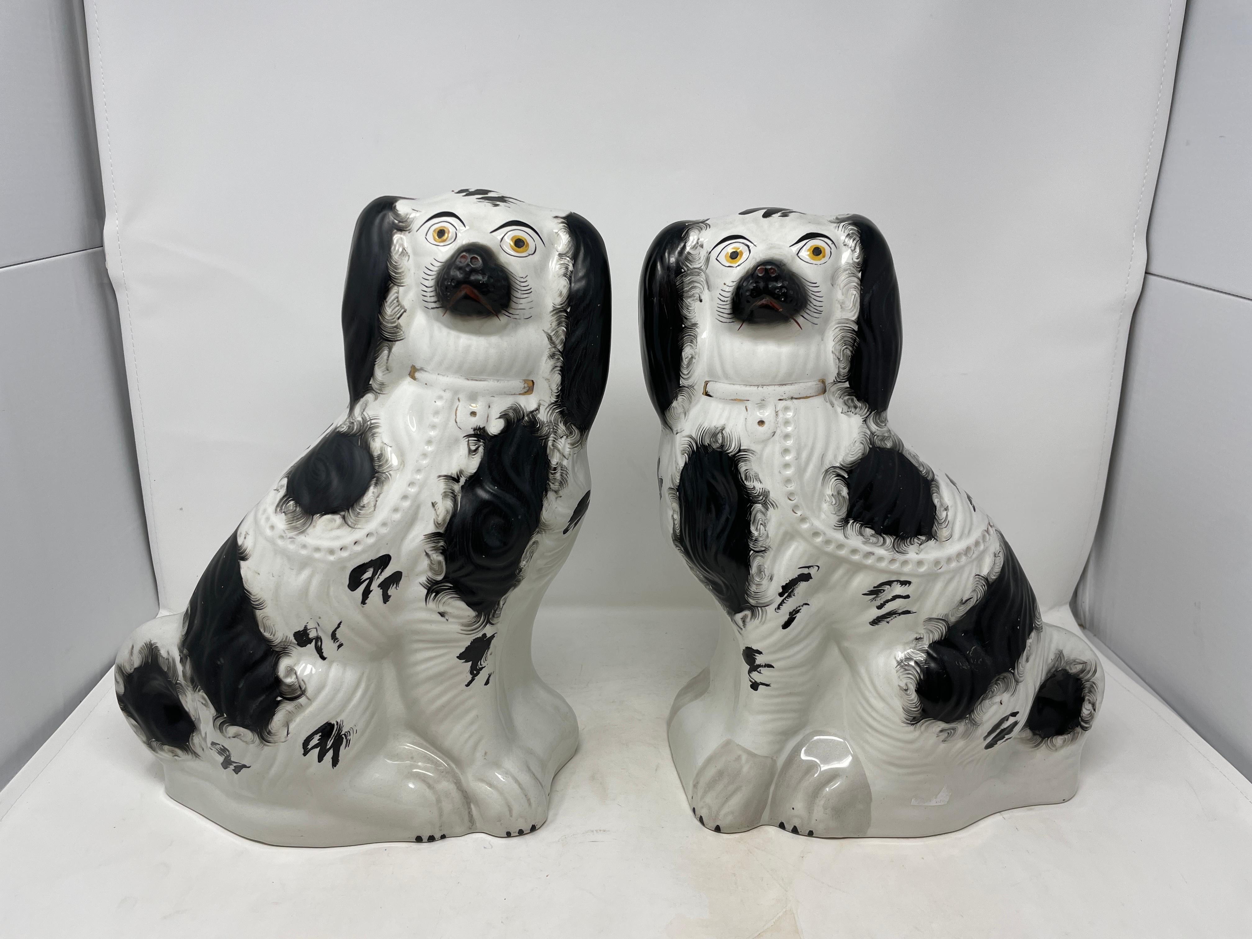 Rare & large pair Antique English black and white Staffordshire Porcelain King Charles Spaniel dogs, circa 1880-1890.
Last two photos show the larger scale of the dogs.
