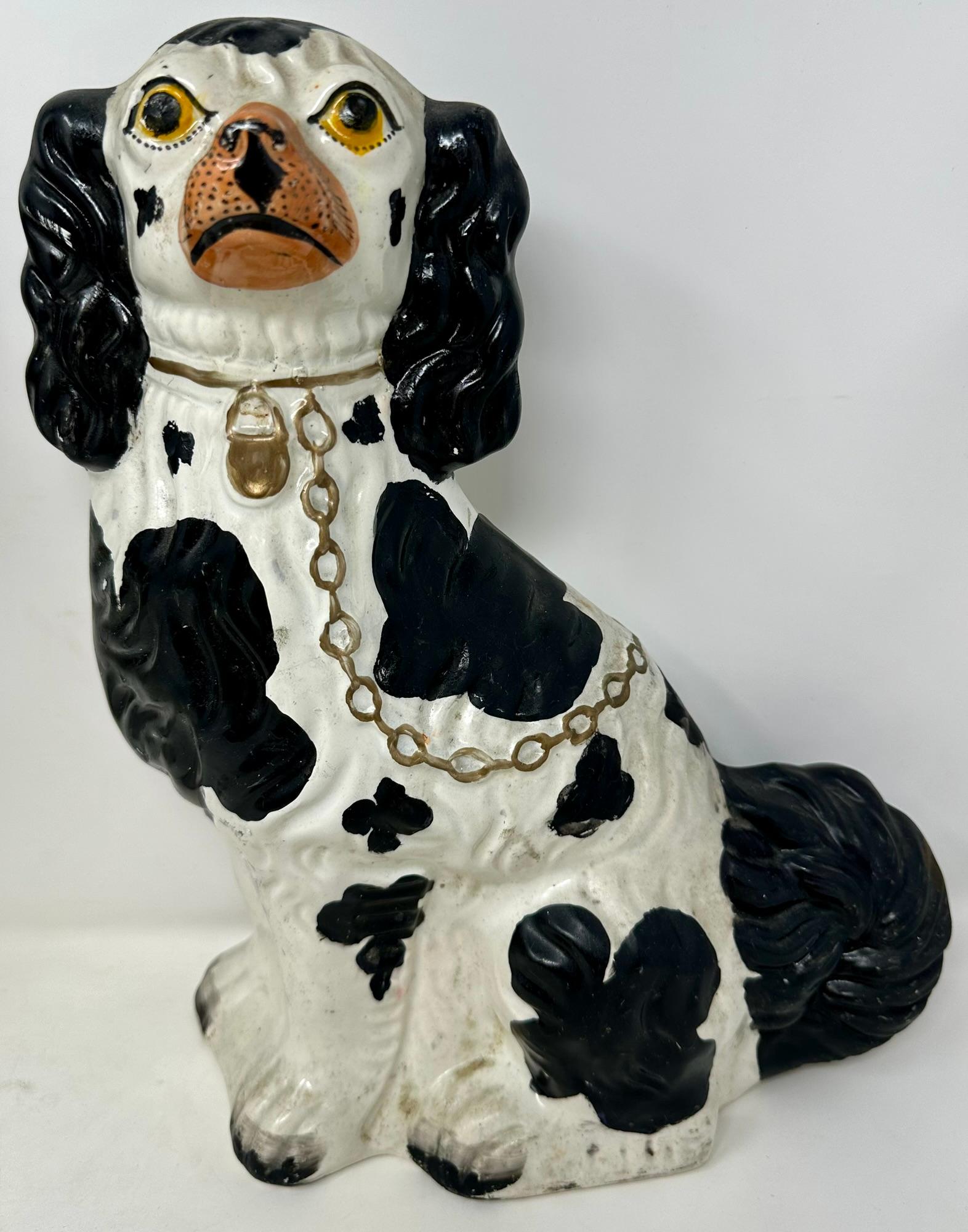 Pair Antique English Staffordshire Pottery Dogs in Black & White, Circa 1860. In Good Condition In New Orleans, LA
