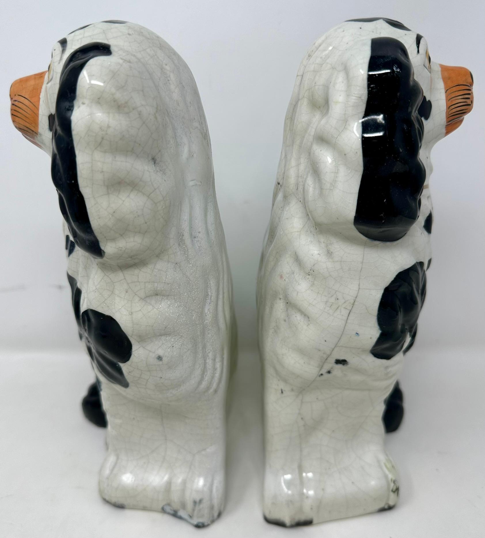 Pair Antique English Staffordshire Pottery Dogs in Black & White, Circa 1890's. In Good Condition In New Orleans, LA