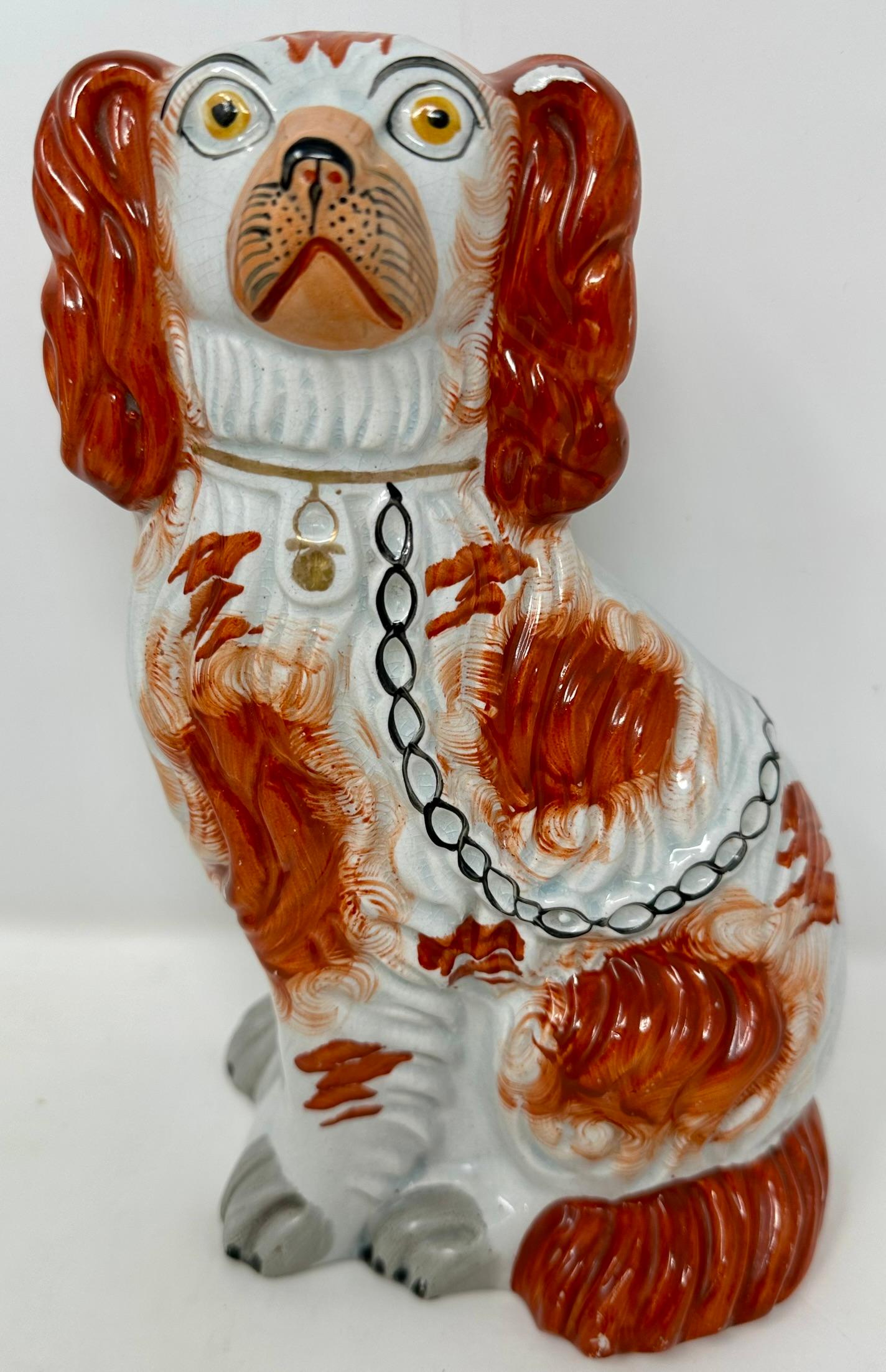 Pair Antique English Staffordshire Pottery Dogs in Orange & White, Circa 1840. In Good Condition In New Orleans, LA