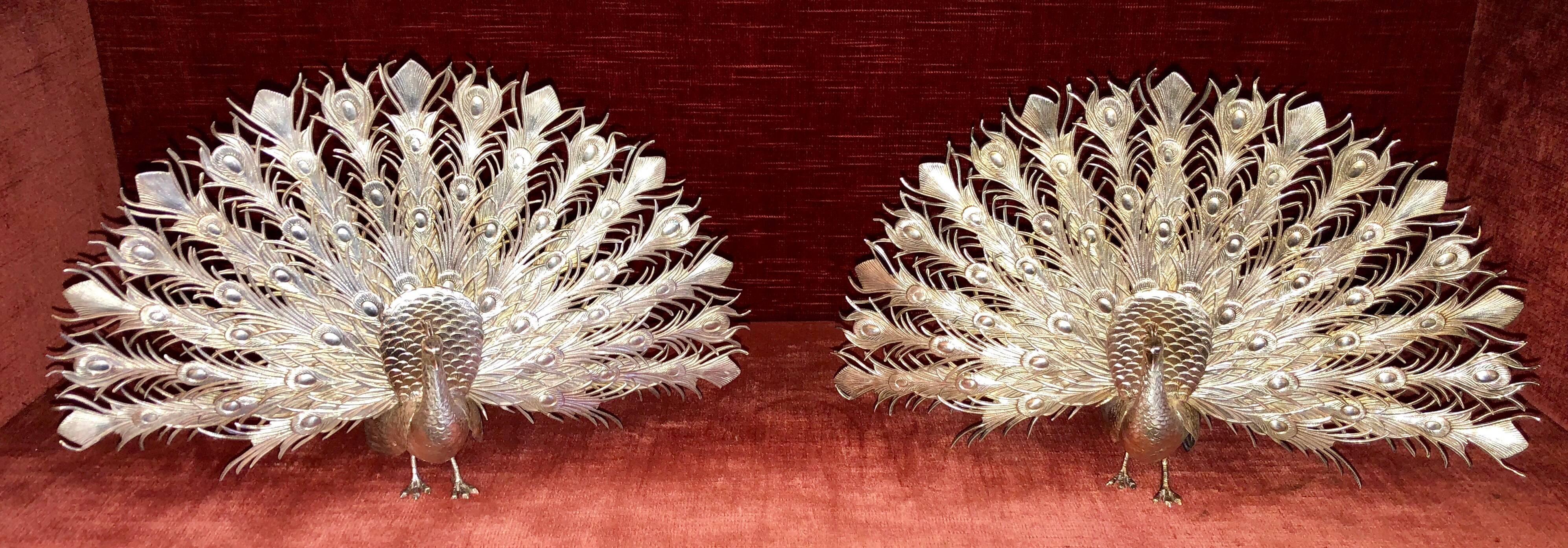 Pair of antique English sterling silver peacocks, circa 1920-1930.