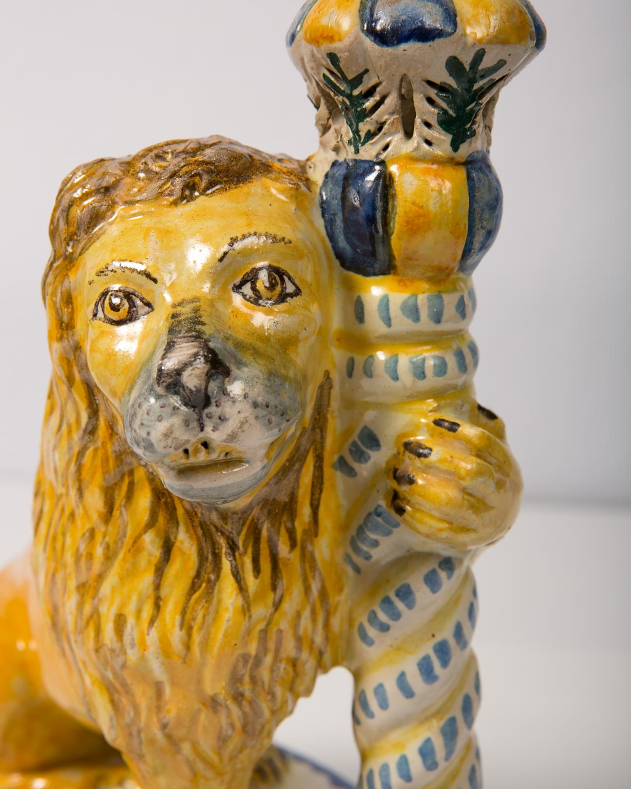WHY WE LOVE IT: They're Italian!
We are pleased to offer this superb pair of antique faience lions holding candlesticks. With friendly smiling faces these lions have lots of personality. Made in Italy in the mid-19th century they have coats with a