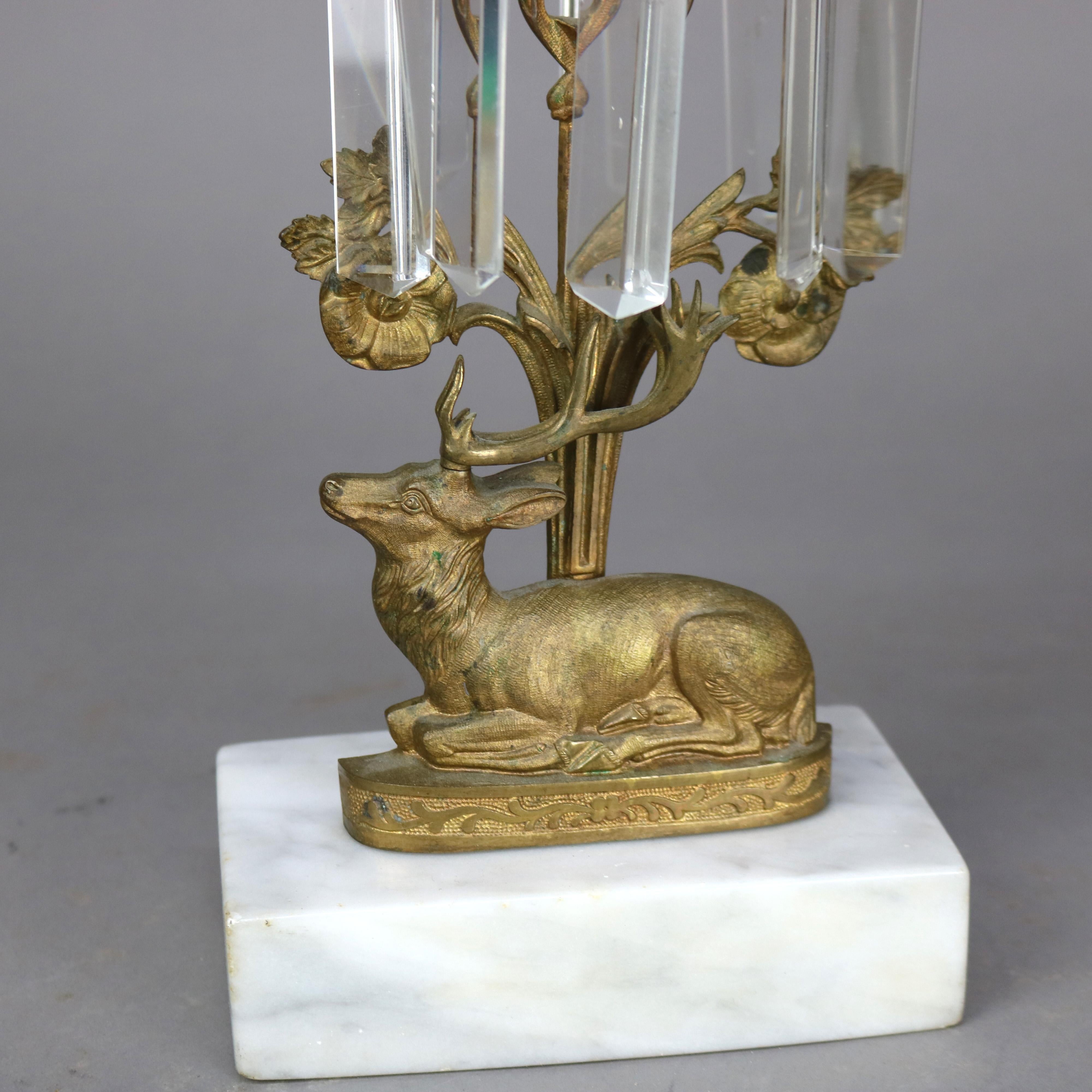 Coppia di antichi portacandele figurati in bronzo e cristallo con base in marmo C1880

Misure: 13,75