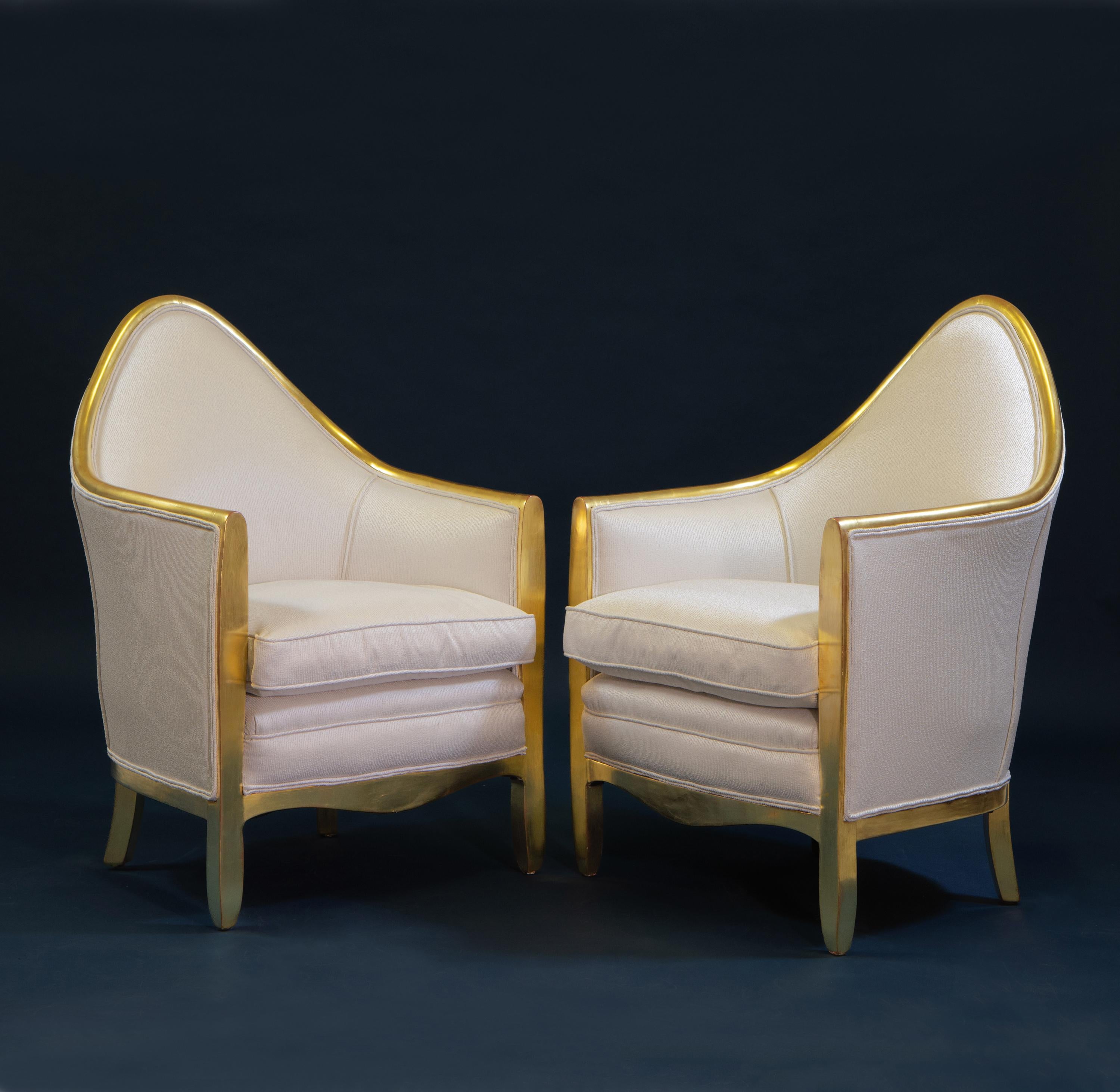 A stunning pair of giltwood bergère armchairs of sublime simplicity. French. Circa 1915-20.

These chairs represent the period of transition from Art Nouveau to Art Deco, and are very much in the manner of Paul Follot, whose early designs reflect