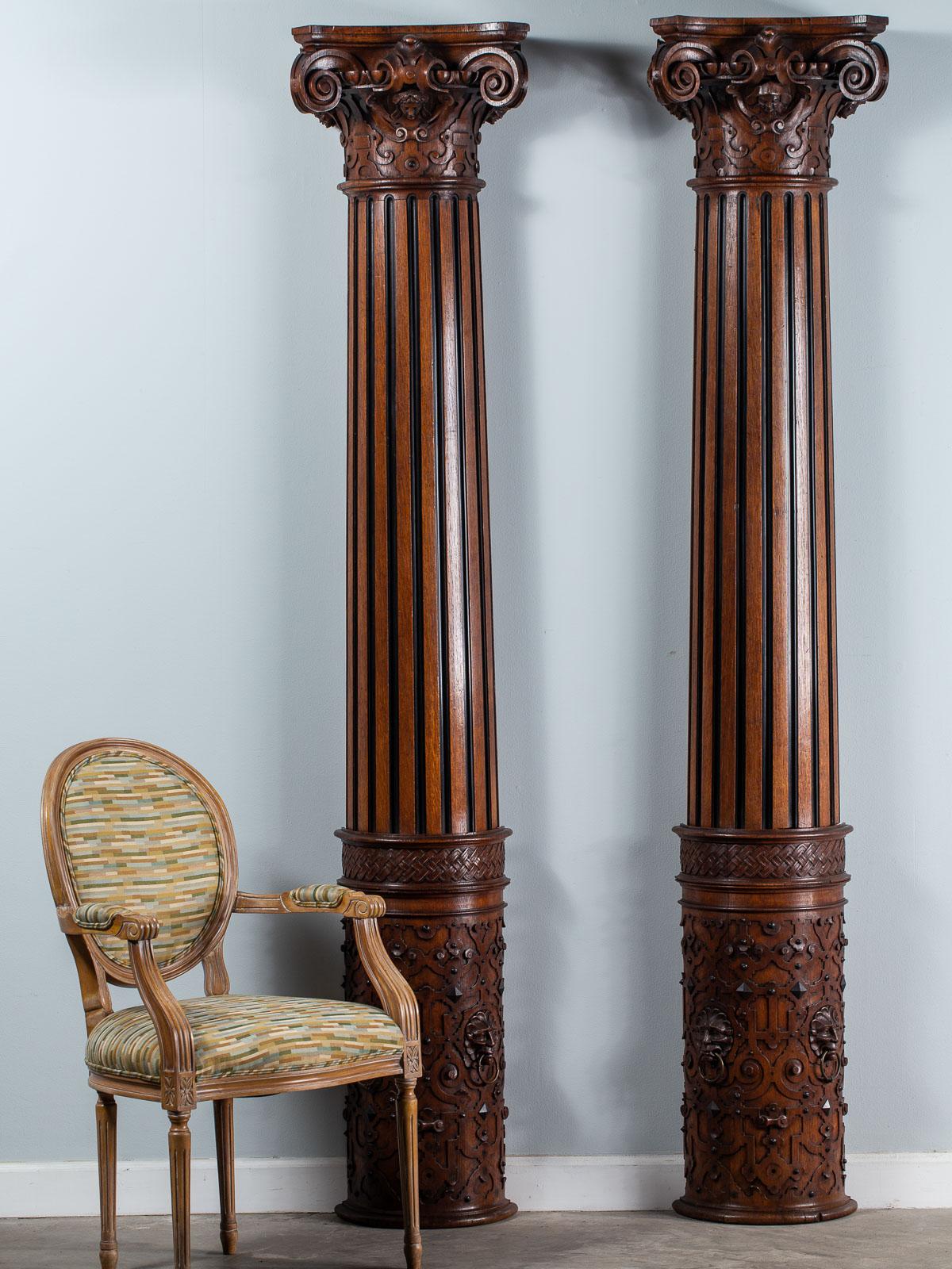 A pair of spectaculer antique French architectural carved oak Henri II style half columns, circa 1860. These impressive antique French architectural columns have a unique combination of motifs that create their stylish impact. The capitals are