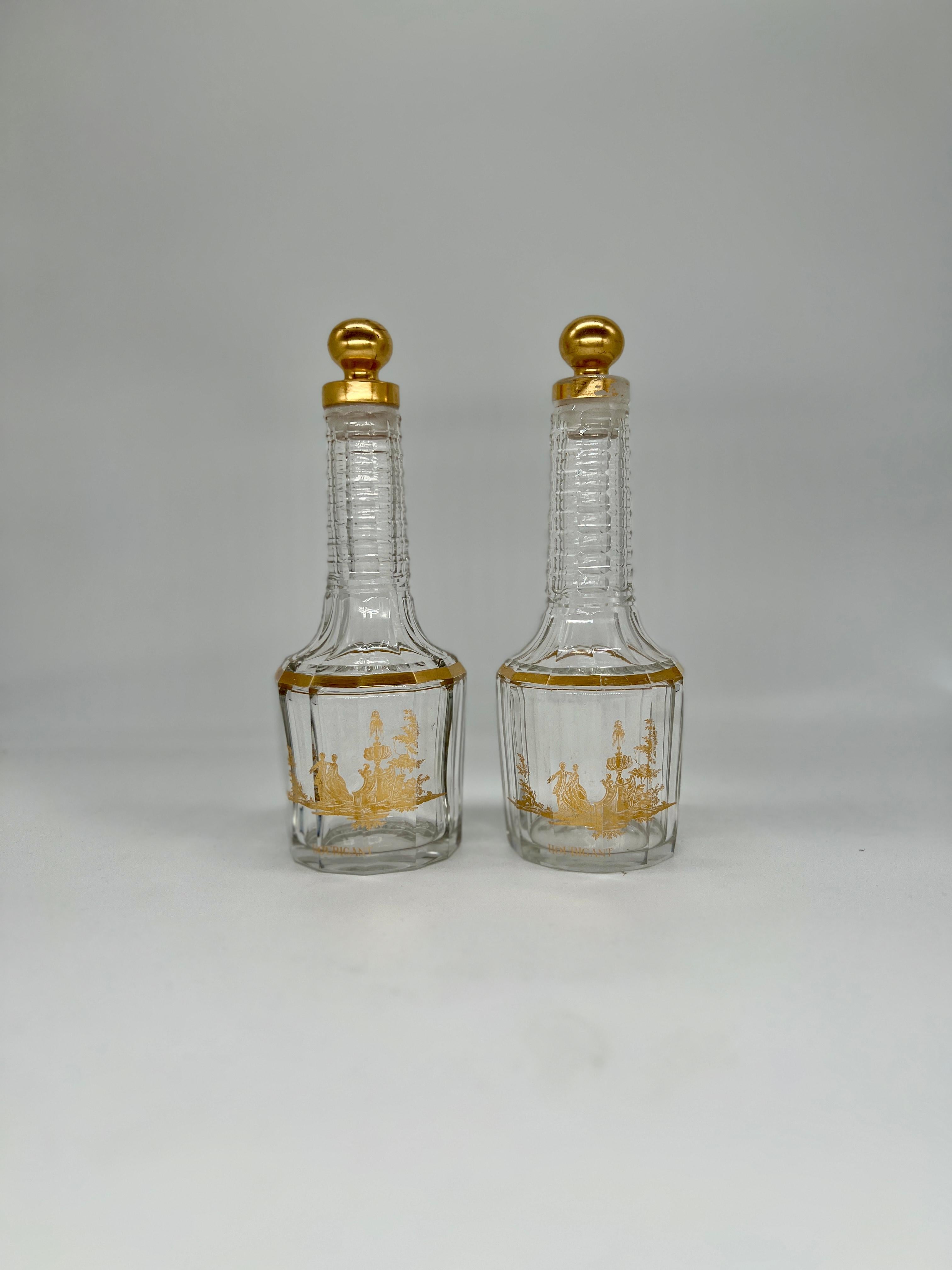 Baccarat (French, founded 1764), circa 1920. 

Offered is a great pair of antique French Baccarat Houbigant pattern gilt crystal perfume bottles, circa 1920. These would make great individual decanter bottles too! 

Each bottle tells a story of