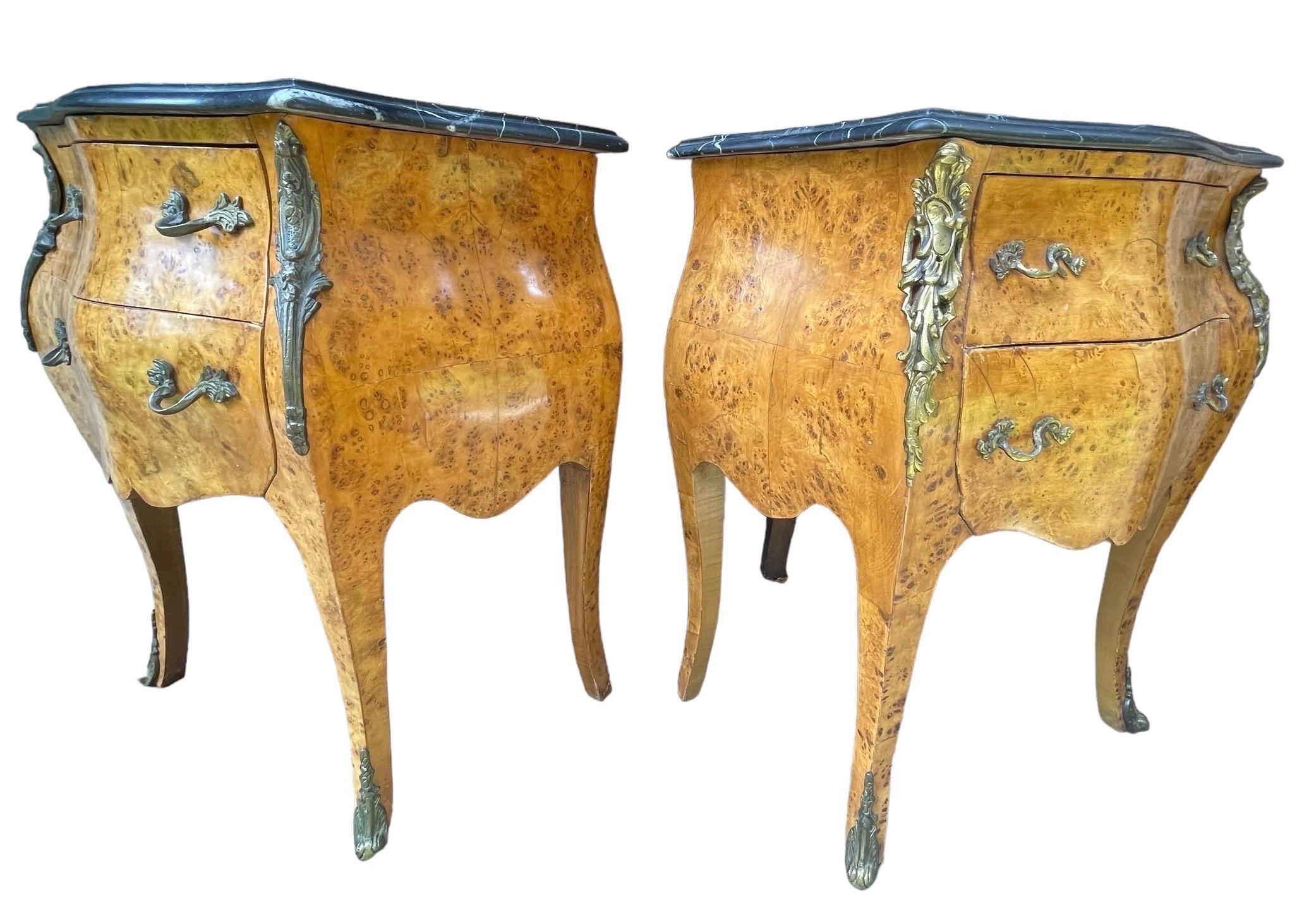 Pair of Louis XV Style Gilt Bronze Mounted Marquetry Slate-Top Antique French Bombe style Chests, Small Console Commodes, Nightstands, End Tables with Gorgeous black marbled tops and Brass Ormolu. From our research and information from the estate we