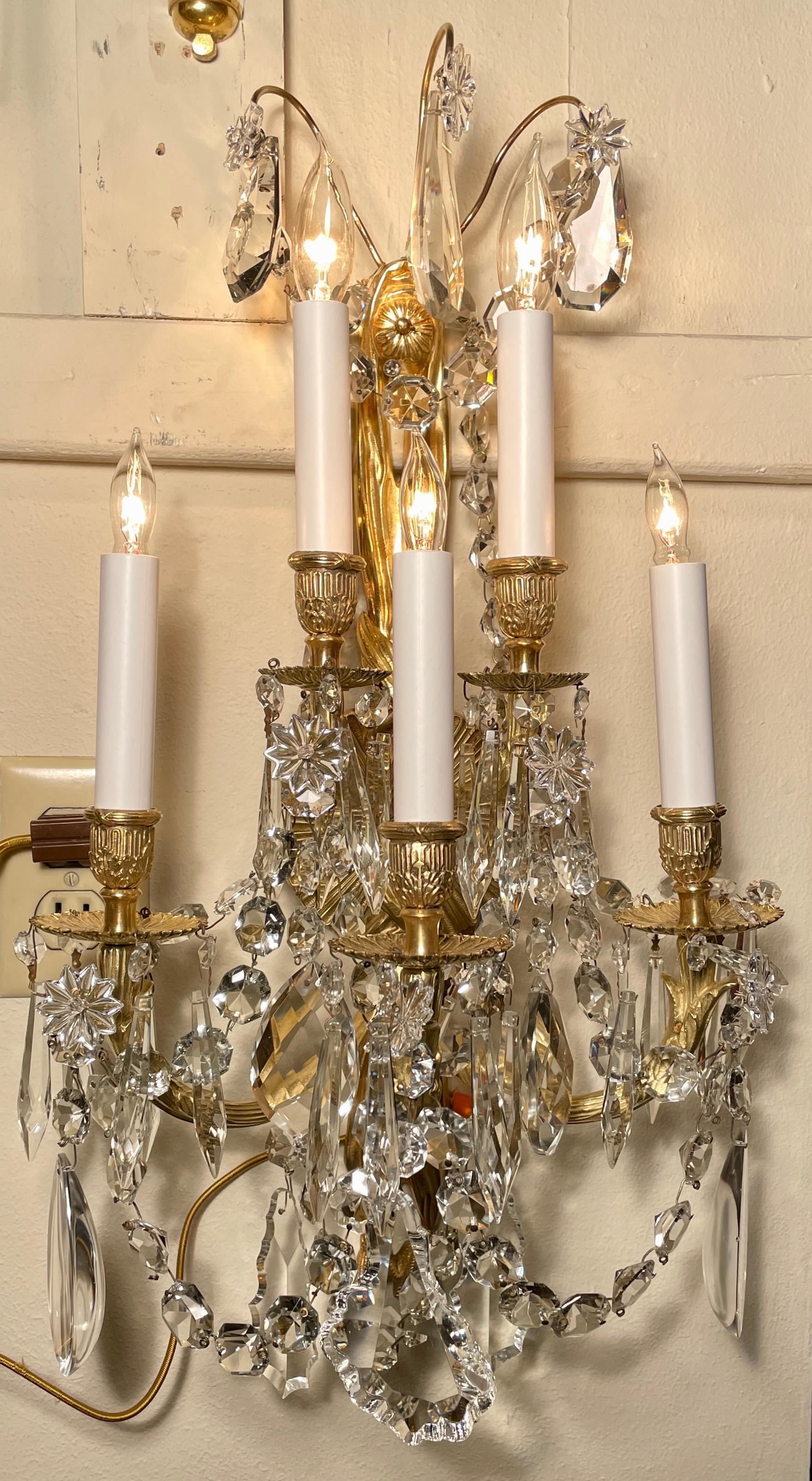 Pair antique French bronze d' ore and crystal wall sconces, circa 1890s.