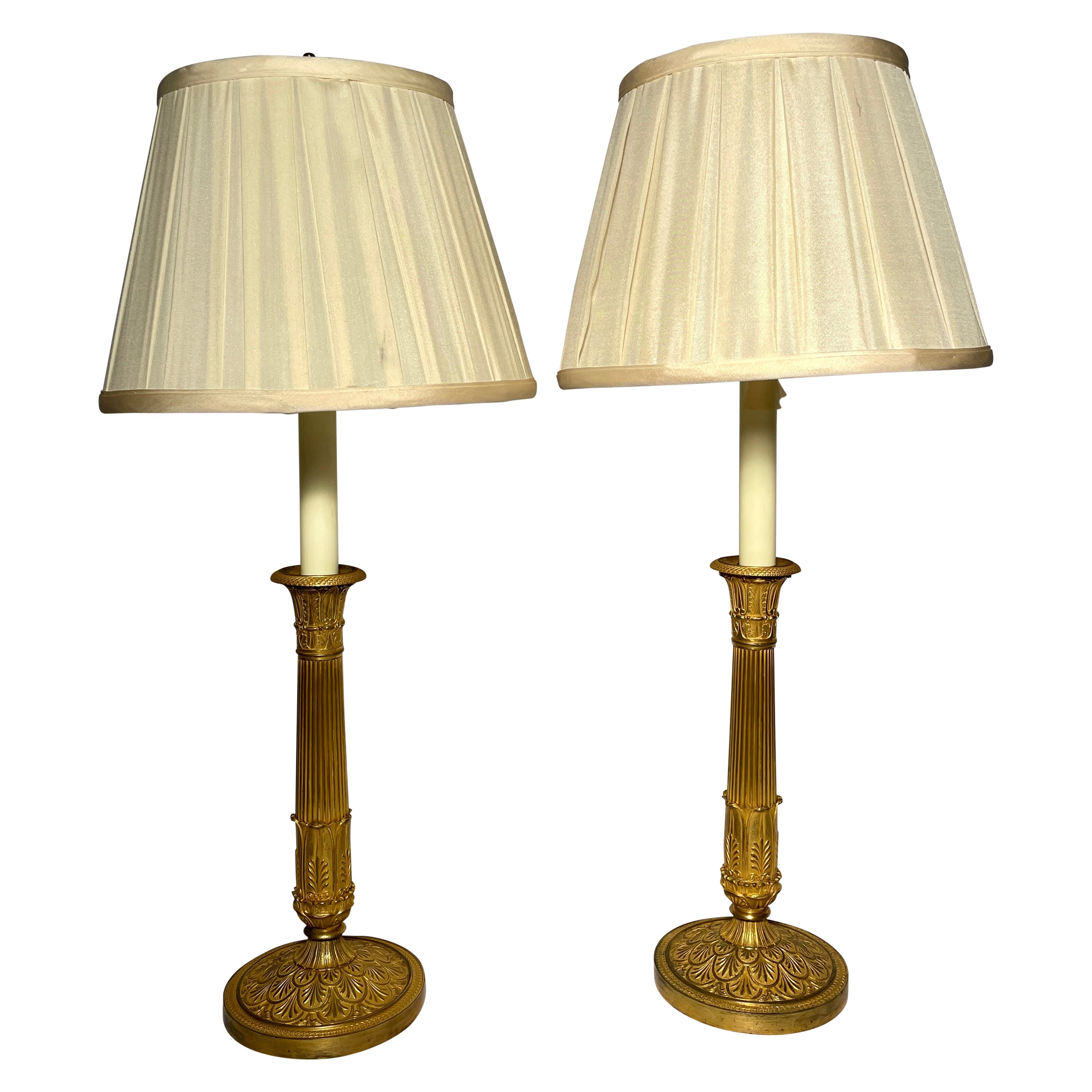 Coppia di candelabri francesi in bronzo D' Ore trasformati in lampade, circa 1860