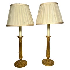 Coppia di candelabri francesi in bronzo D' Ore trasformati in lampade, circa 1860
