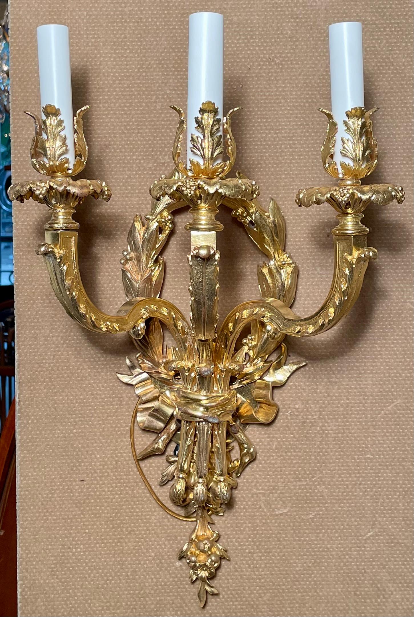 Pair antique french bronze d'ore 3 light wall sconces, circa 1890s.