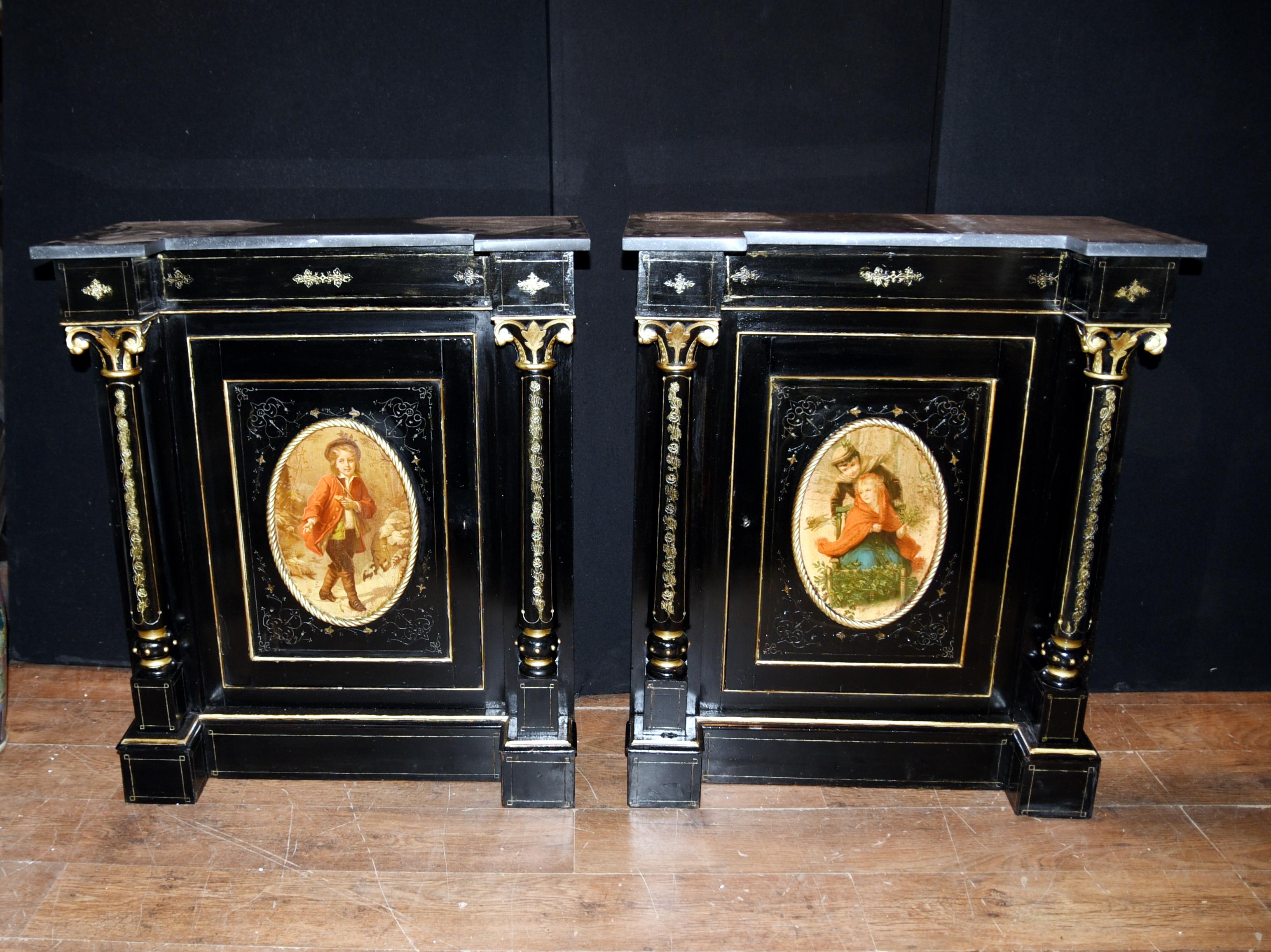 - Wonderful pair of antique French Empire cabinets with ebonized finish
- Great interiors look to this pair
- Look at the wonderful hand painted oval plaques with children, very detailed
- We date this pair to circa 1880
- Purchased from a