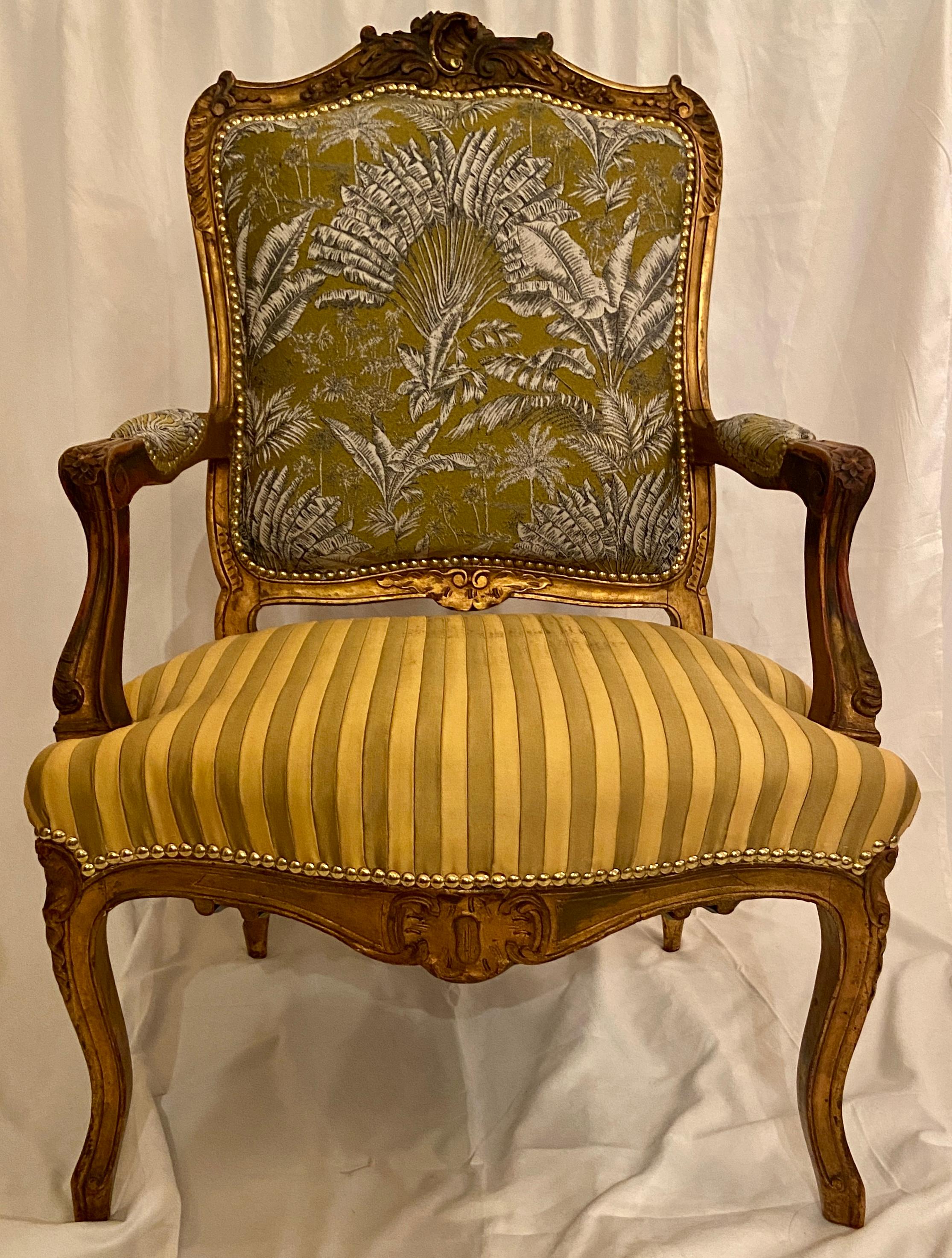 Pair Antique French carved walnut yellow & green upholstered armchairs, Circa 1860. A great pair of French armchairs. Nicely upholstered as well.