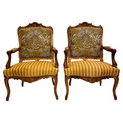 Pair Antique French Carved Walnut Upholstered Armchairs, circa 1860