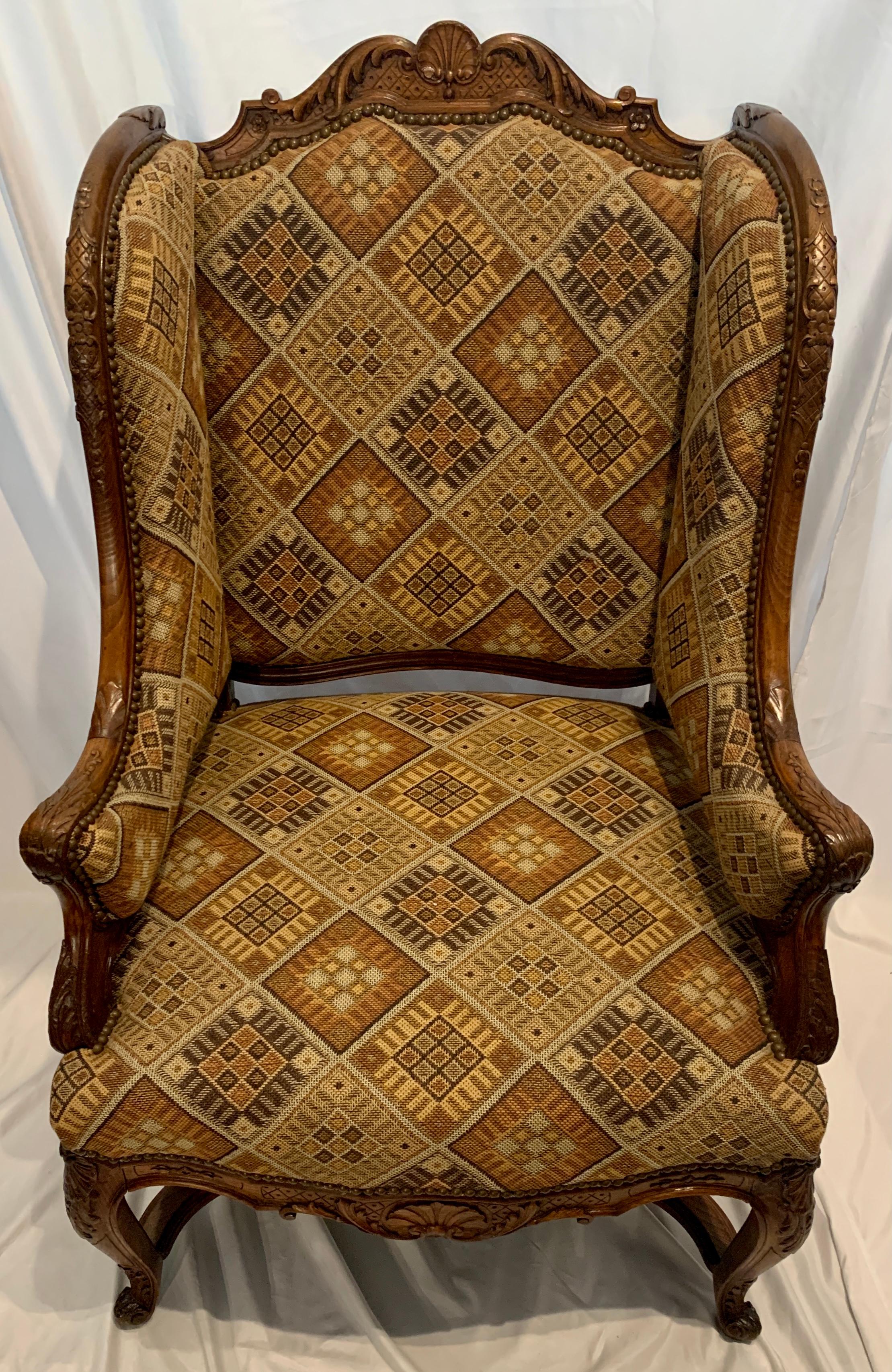 Pair Antique French carved walnut upholstered bergeres / Armchairs, Circa 1880.