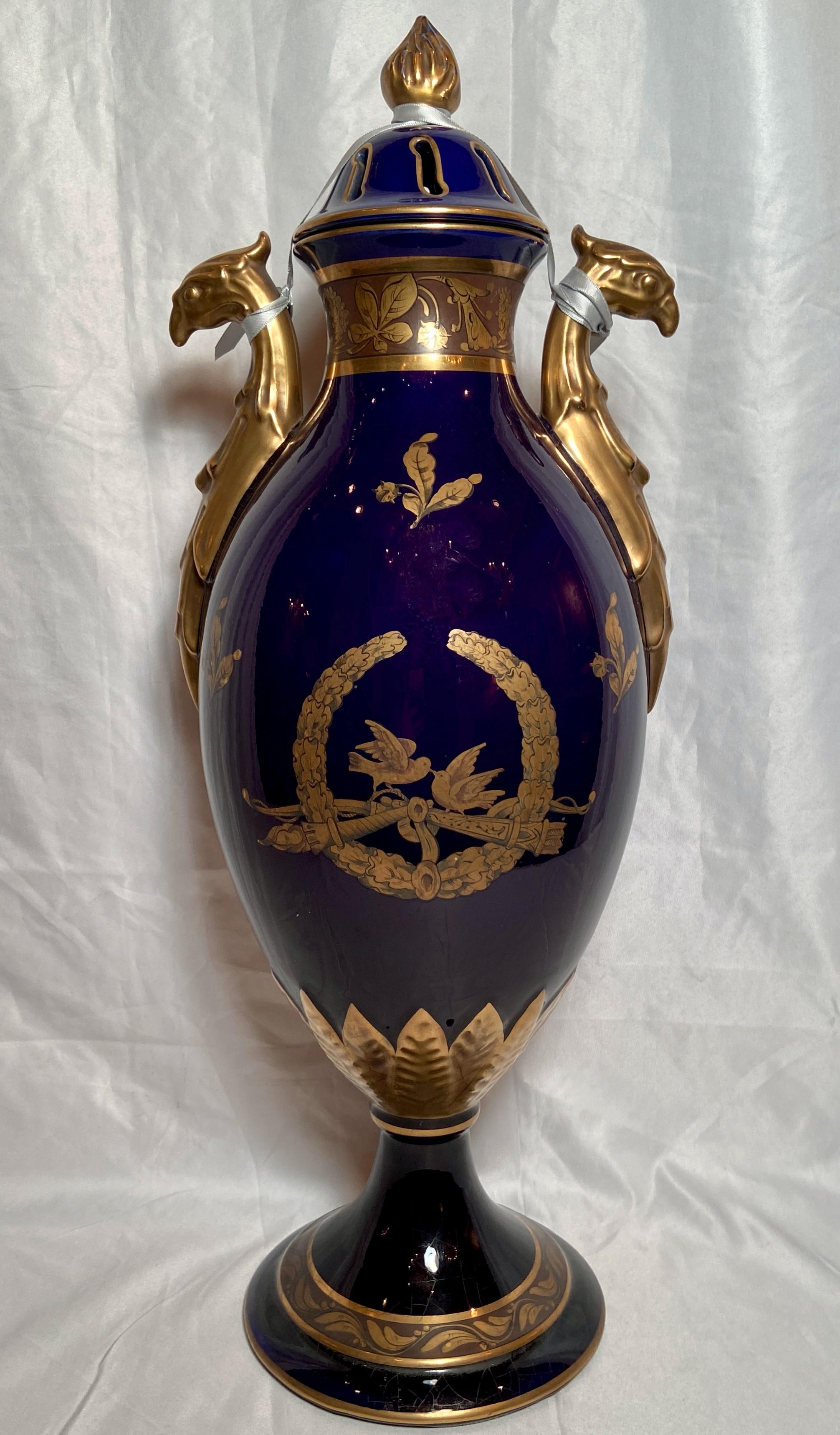 Pair antique French cobalt blue and gold porcelain Urns, Circa 1900-1910.