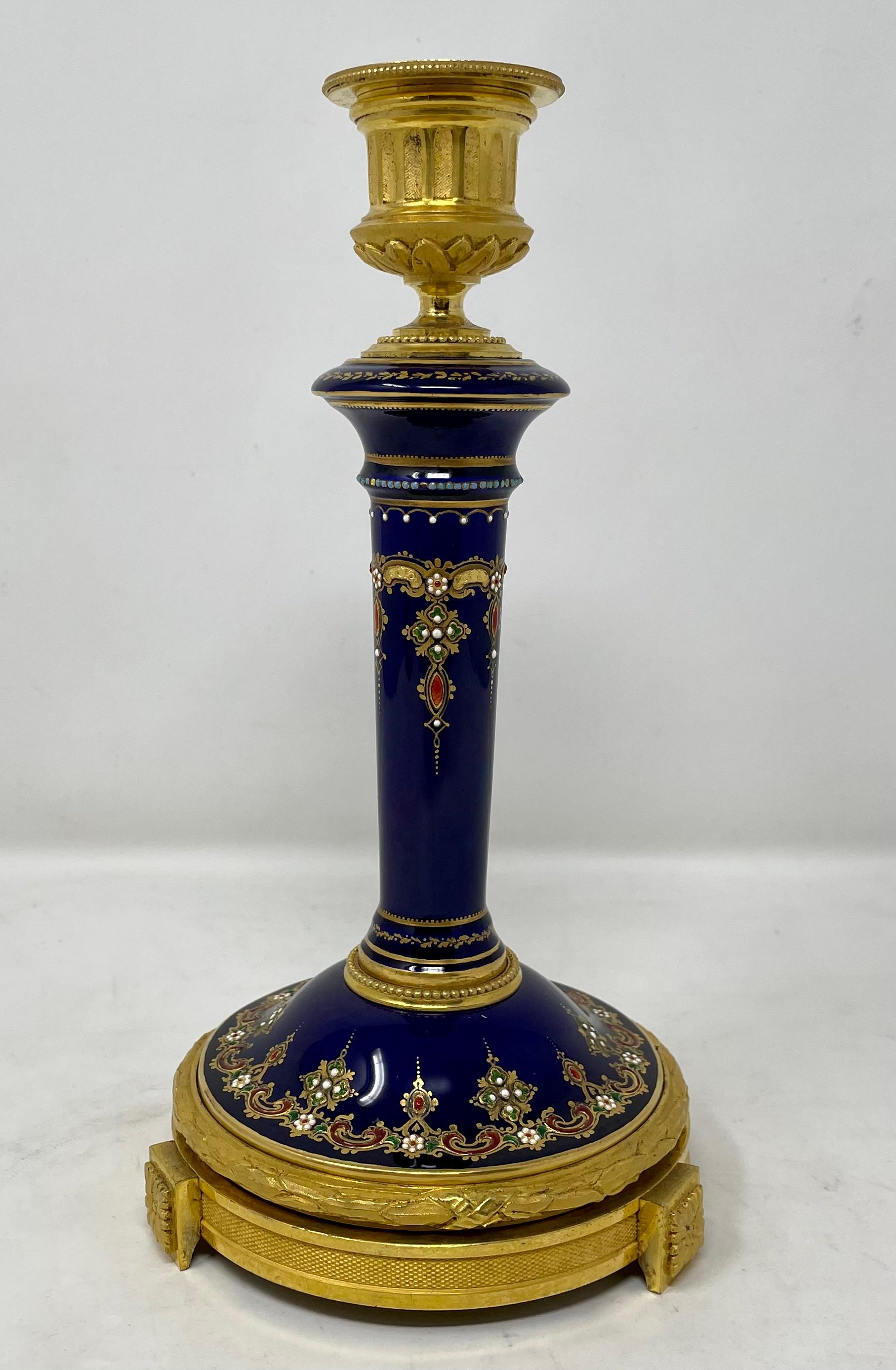 Pair antique French cobalt jeweled enamel porcelain and gold bronze candlesticks, Circa 1890.