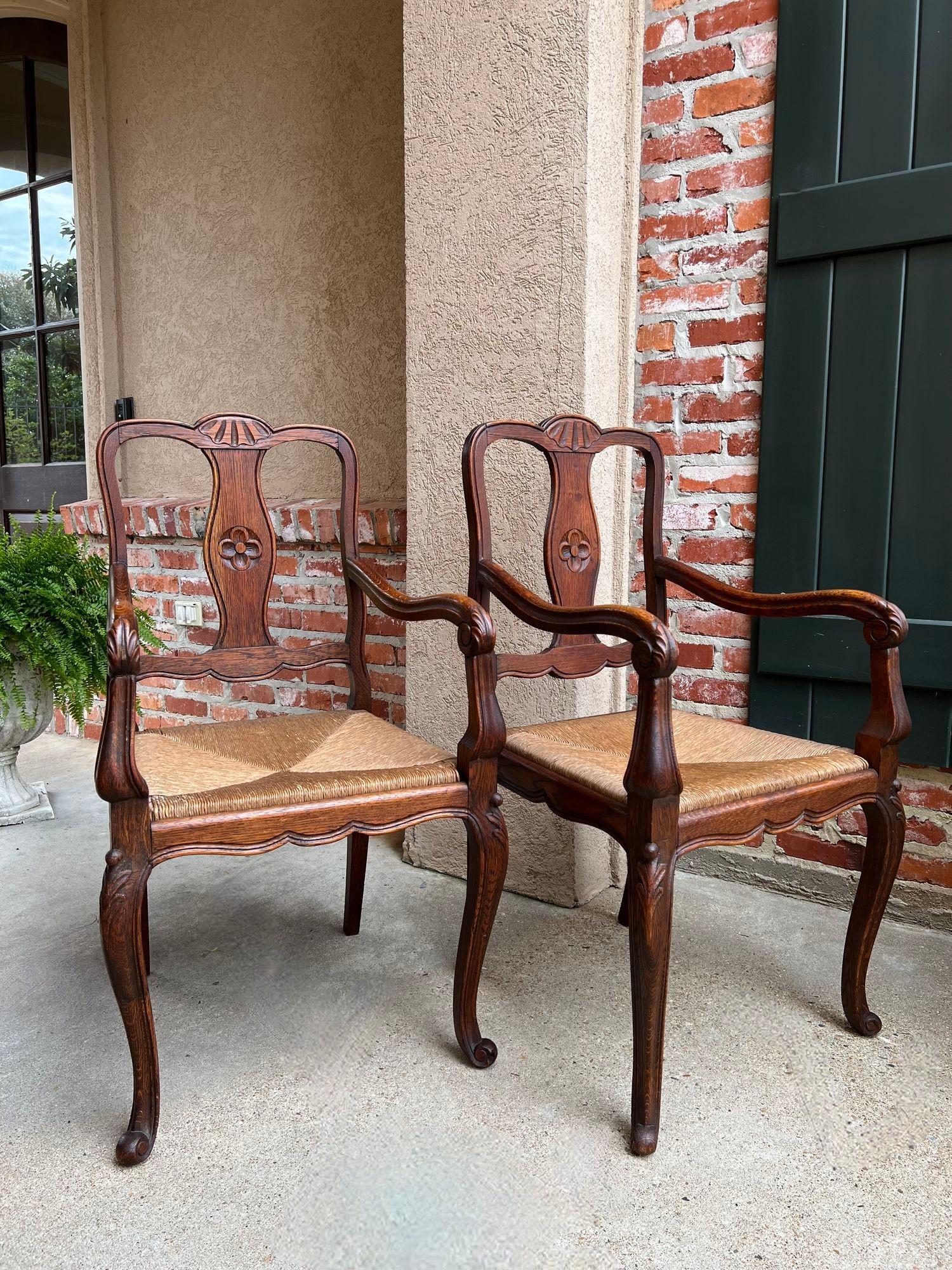 PAIR Antique French Country Carved Oak Dining ARM Chair Rush Seat Set of 2 In Good Condition For Sale In Shreveport, LA
