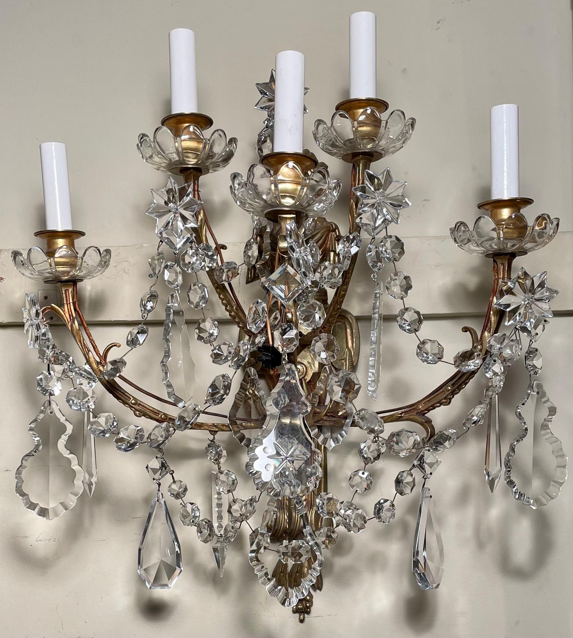 Pair antique French cut crystal and gold bronze five-light sconces, Circa 1890-1910.