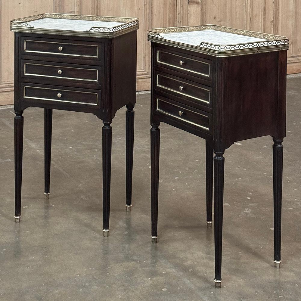Pair Antique French Directoire Mahogany End Tables with Carrara Marble will make a delightful addition to your room, providing storage, display, perhaps a place for a lamp, three convenient drawers, and tailored elegance that is truly timeless, and