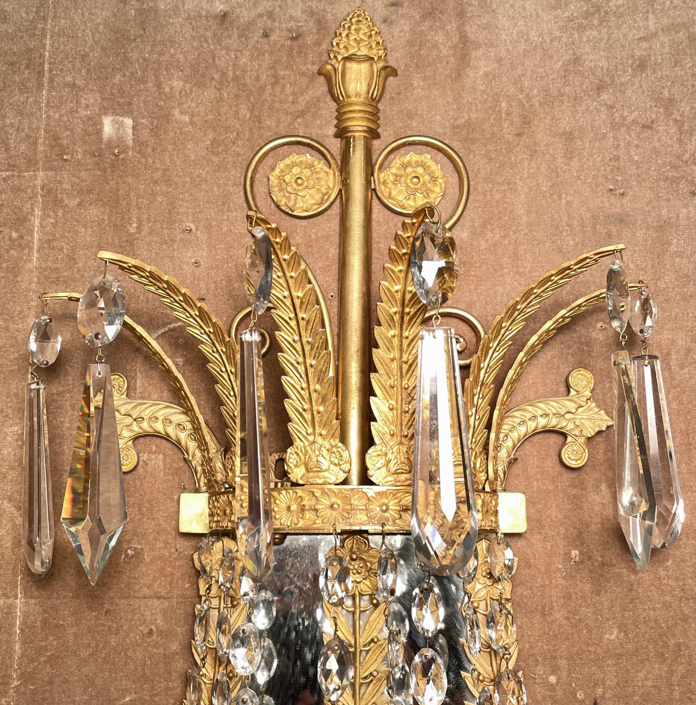 gold and crystal sconces