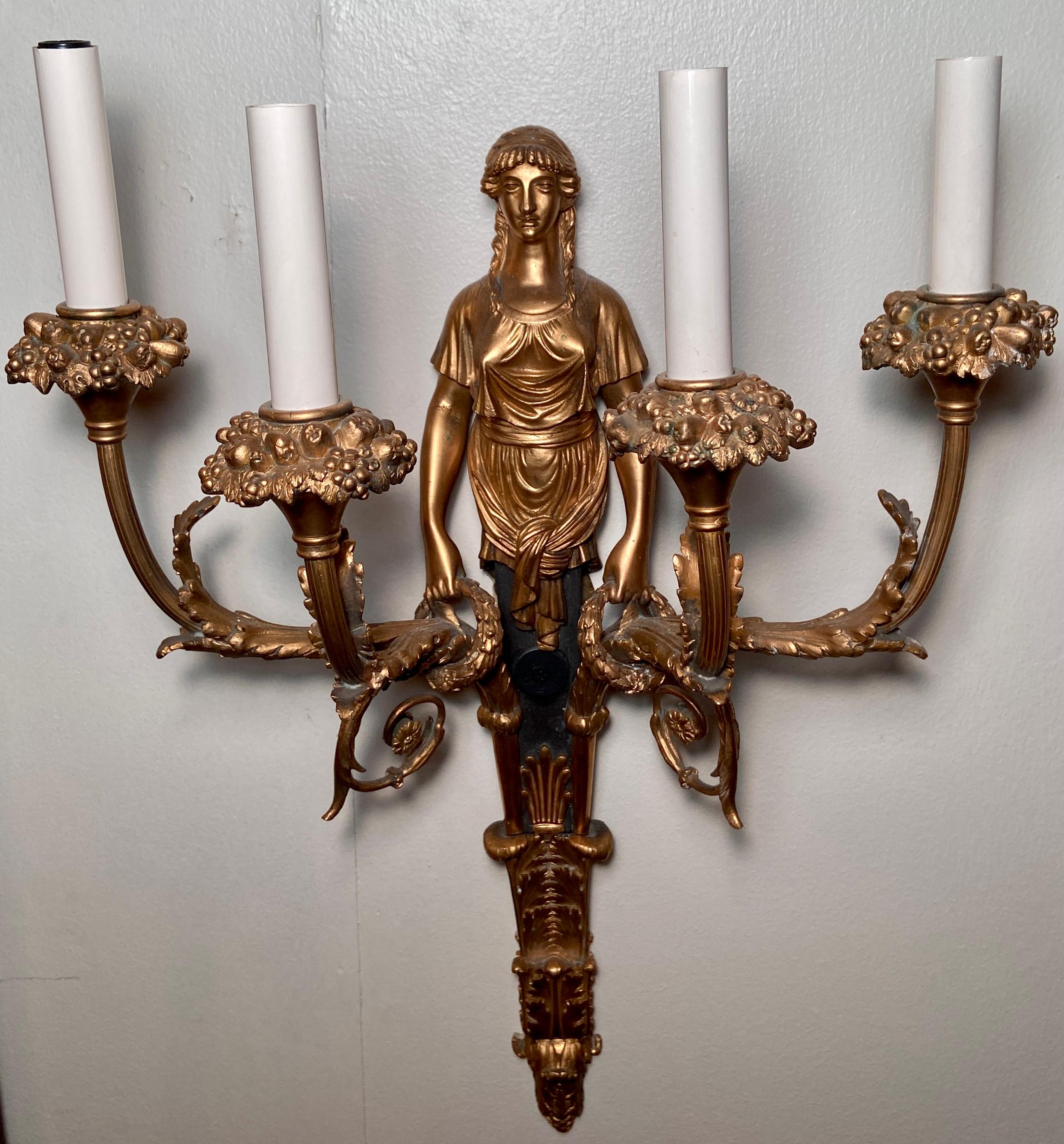 Pair antique bronze D'ore French Empire wall-lights, circa 1830-1850.