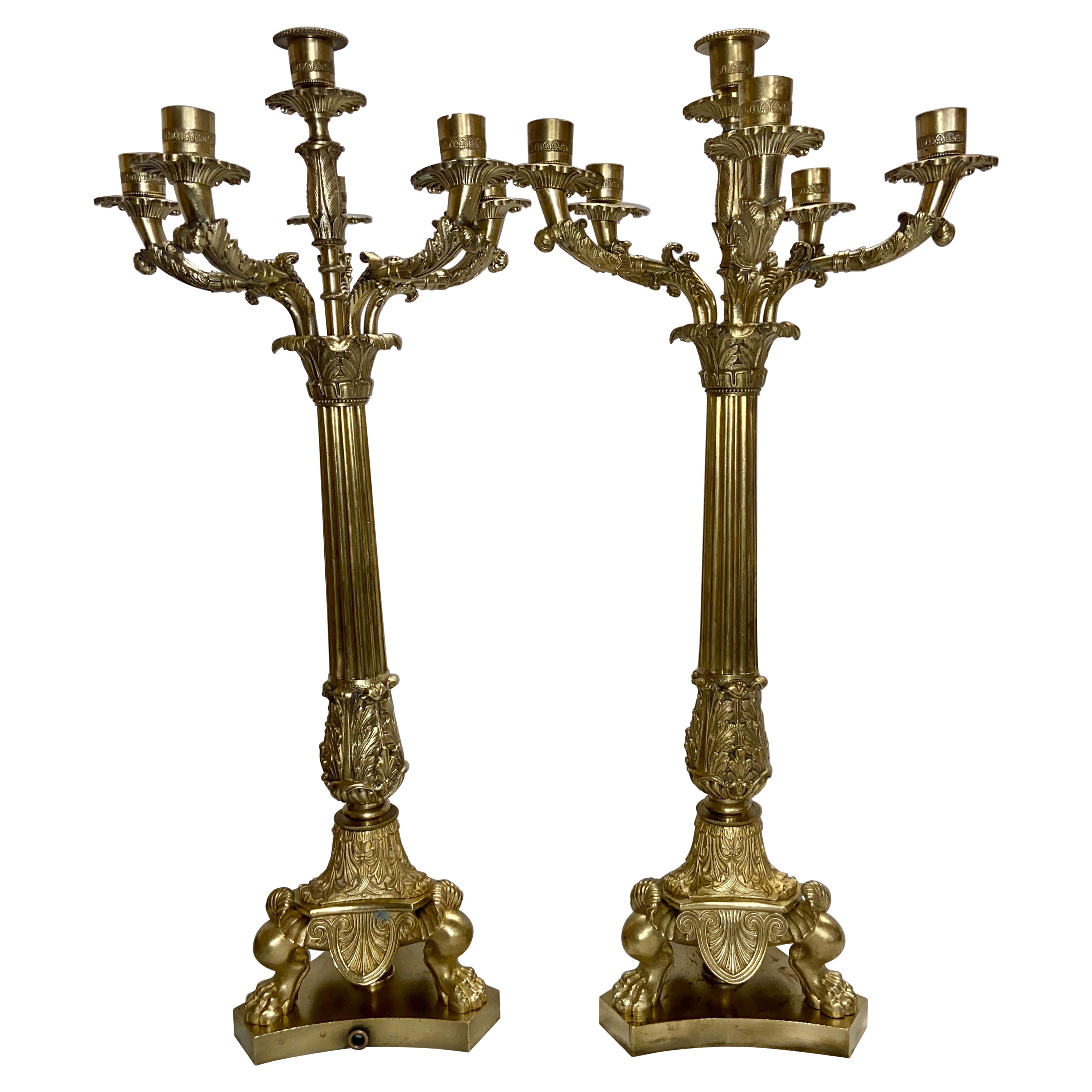 Paar antike französische Empire-Kandelaber aus Gold und Bronze