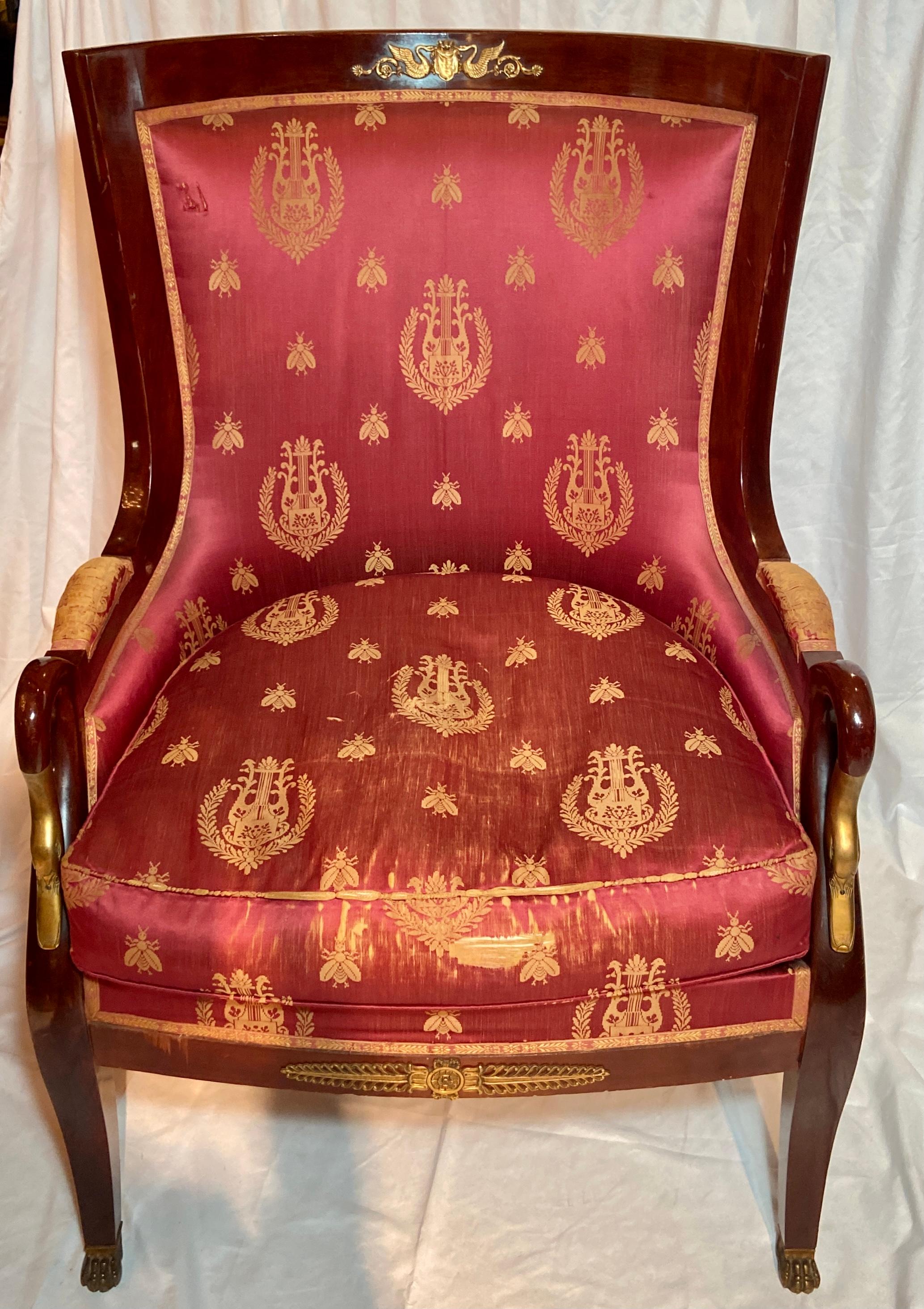 Pair antique French Empire ormolu mounted mahogany bergere armchairs with red & gold upholstery, Circa 1890.