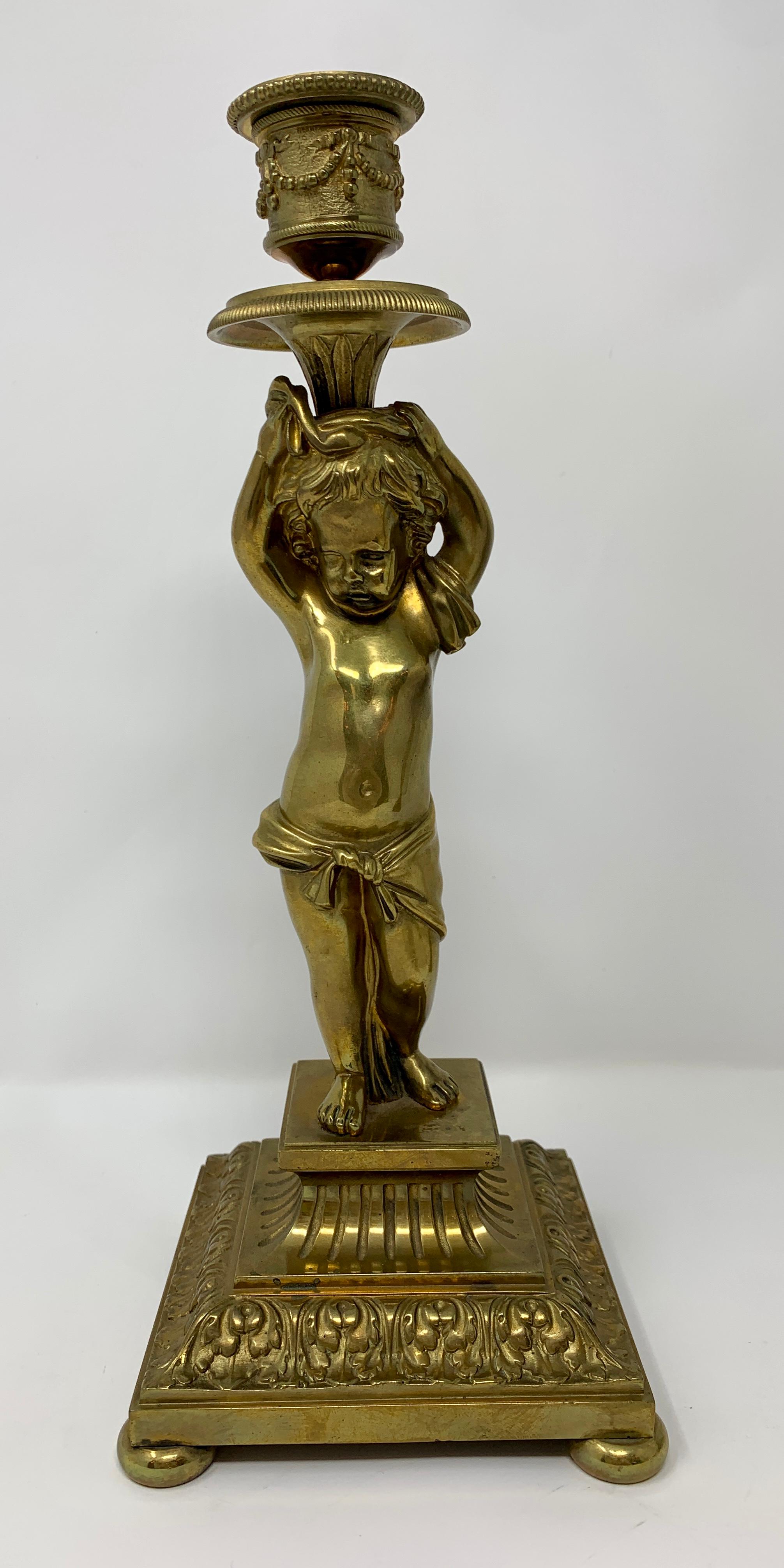 Gilt Pair of Antique French Gold Bronze Cupid Candlesticks For Sale