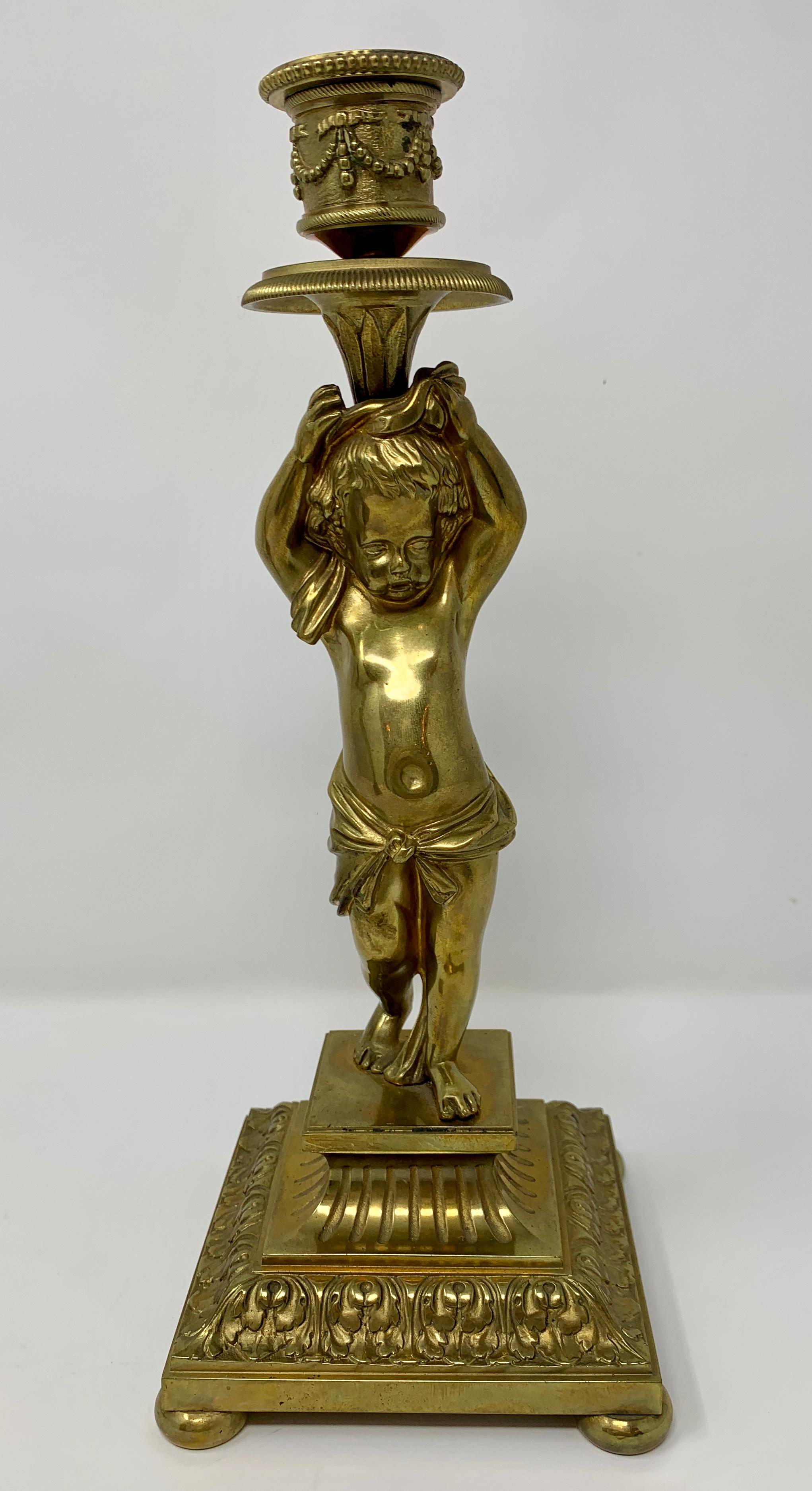 Pair of Antique French Gold Bronze Cupid Candlesticks In Good Condition For Sale In New Orleans, LA