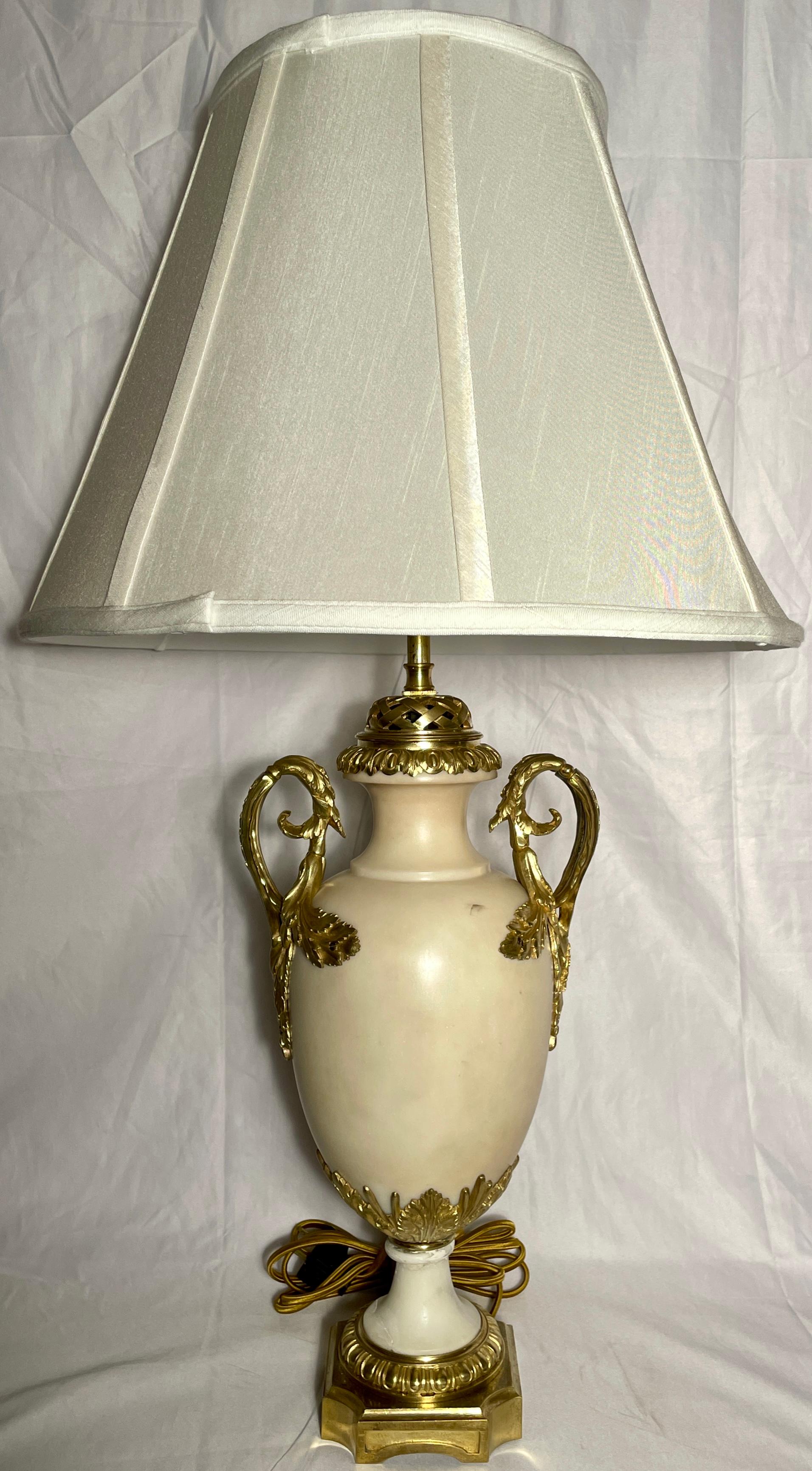 Pair antique French gold bronze mounted Carrara marble lamps, Circa 1890's.