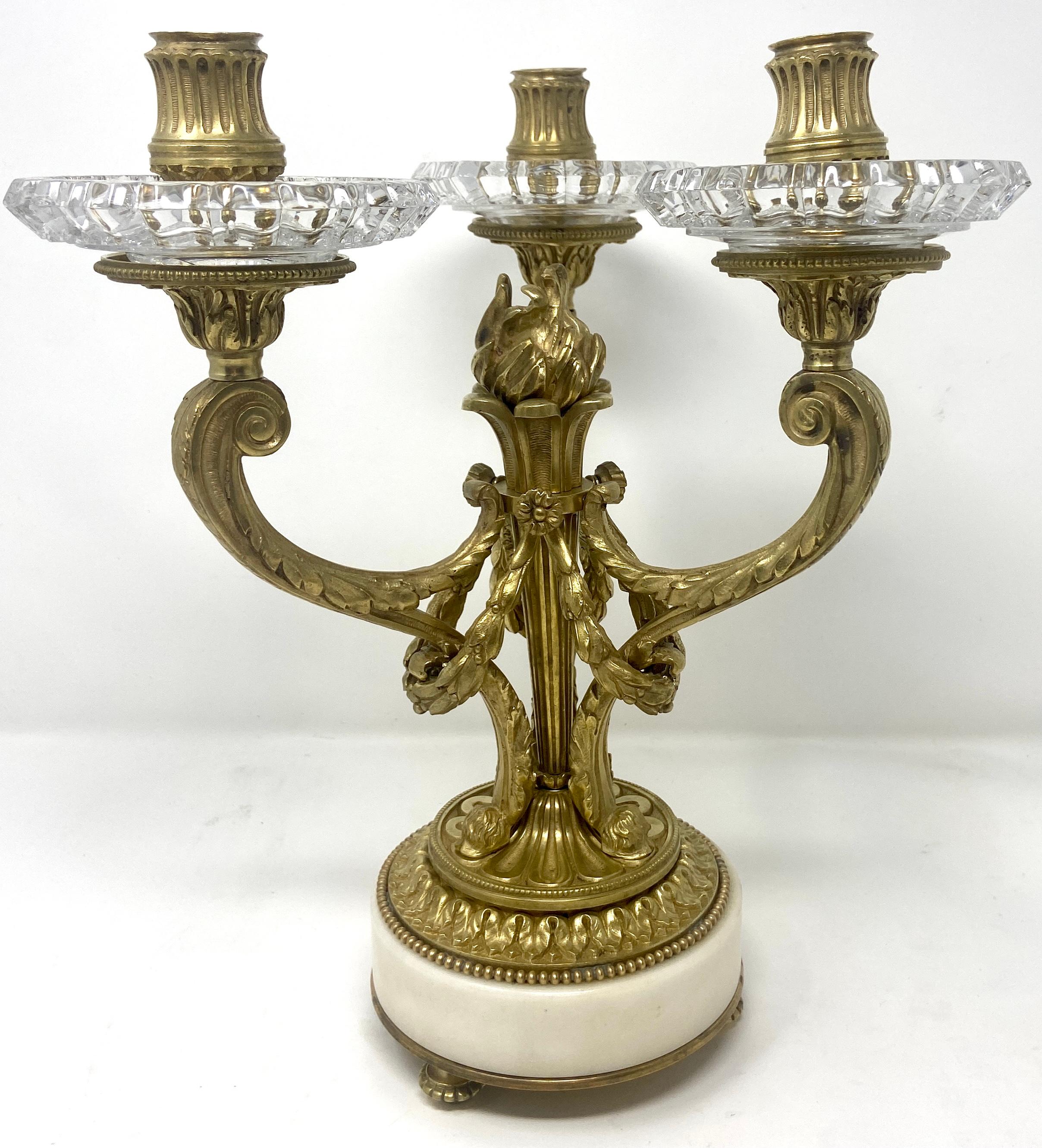 Pair Antique French Gold Bronze with cut crystal & marble candelabra, circa 1880.
These small three arm candelabra will work nicely in a variety of settings and they are marked at a favorable price.