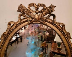 Pair Antique French Gold Leaf Oval Mirrors, Circa 1885-1895.