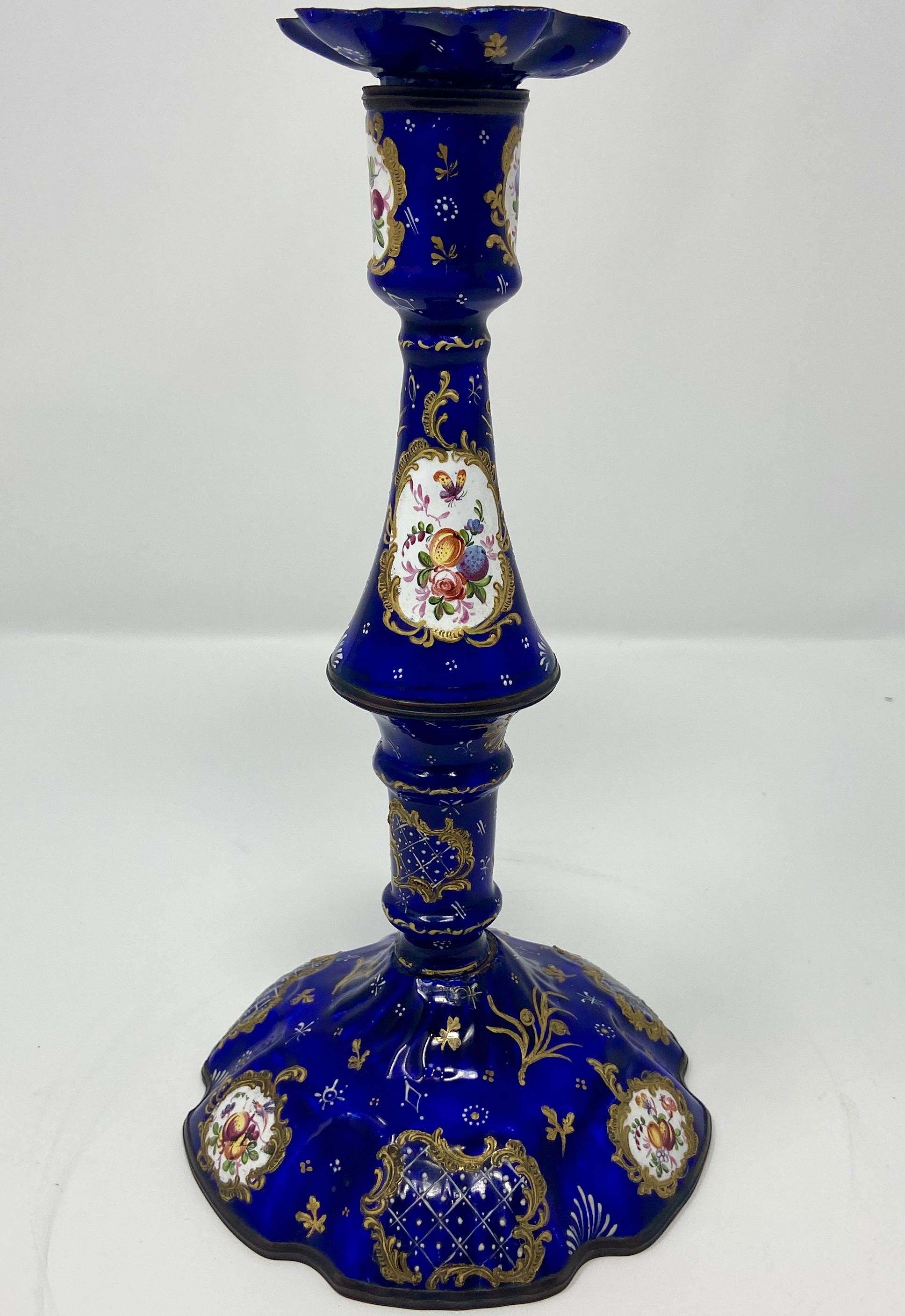 Pair antique French hand-painted blue enameled porcelain candlesticks, circa 1840.