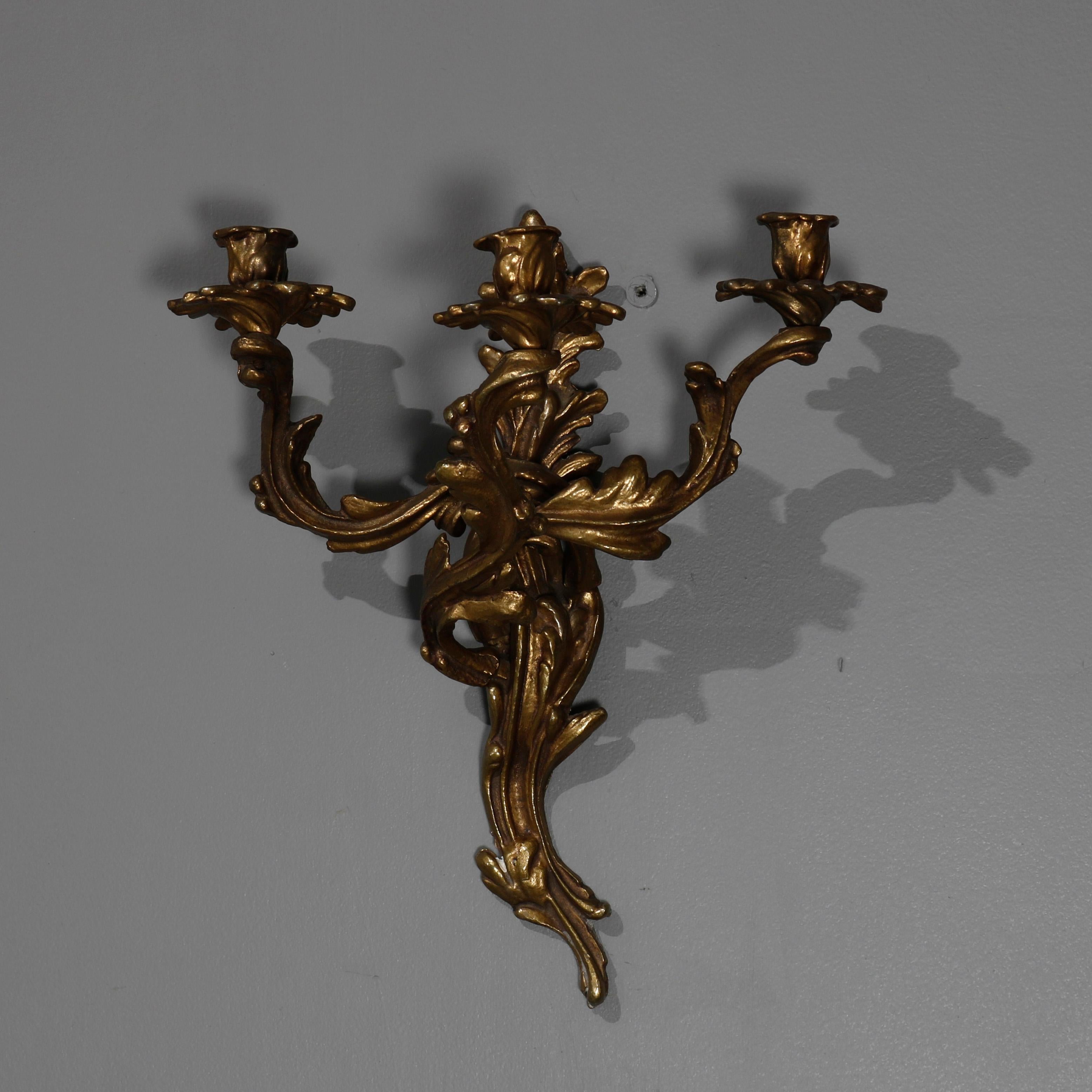 A pair of antique French Louis XIV wall sconces offer cast bronze in foliate form with three arms terminating in candle sockets, circa 1880.

***DELIVERY NOTICE – Due to COVID-19 we are employing NO-CONTACT PRACTICES in the transfer of purchased