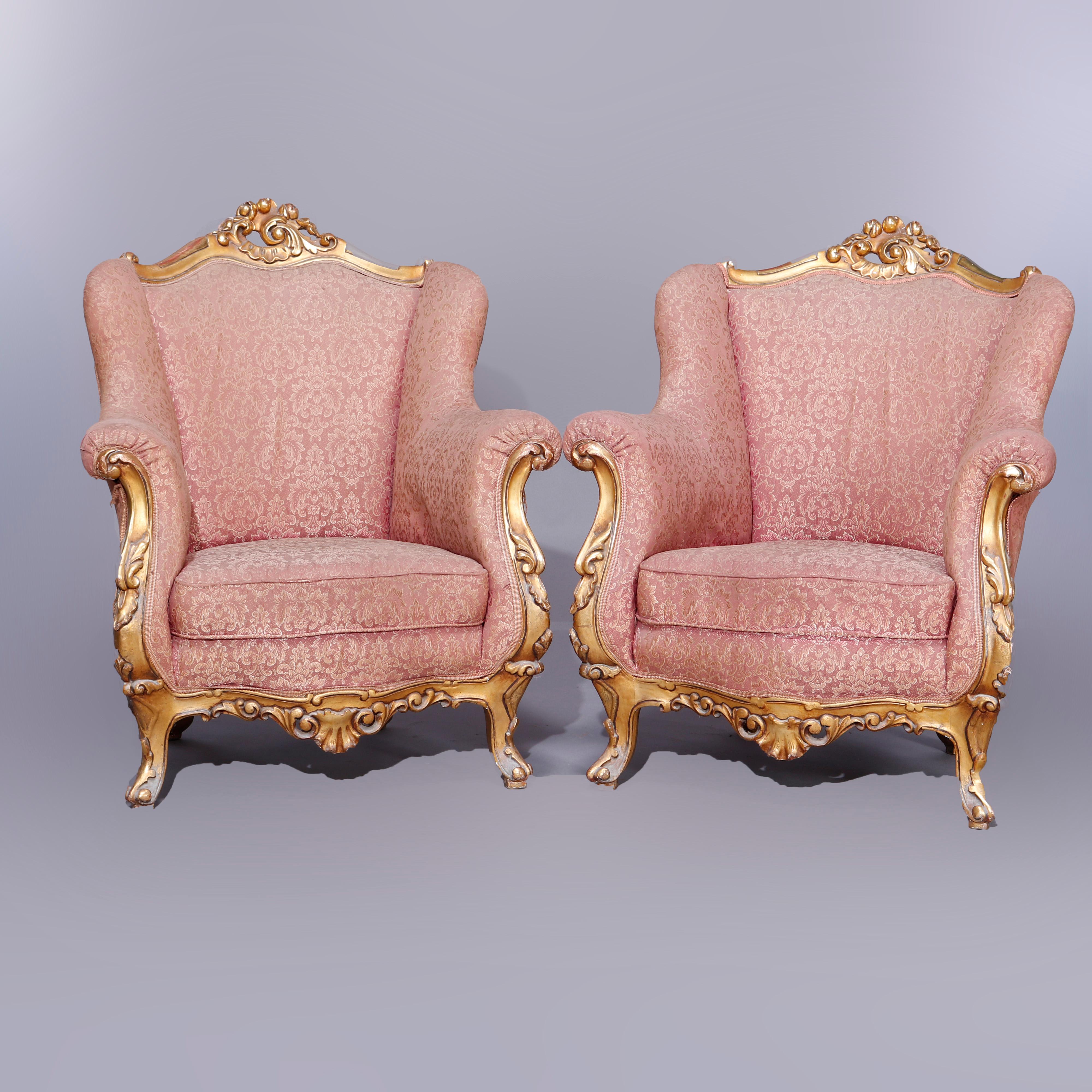 Carved Pair Antique French Louis XIV Gilt Wood Upholstered Wing Back Chairs, Circa 1910