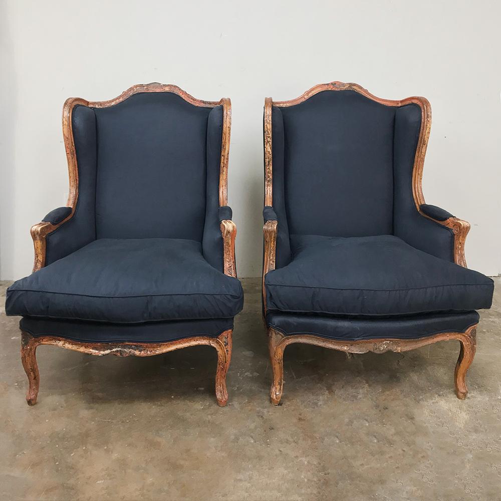 Pair of antique French Louis XV bergères feature graceful naturalistic lines, an intriguing distressed finish, and upholstery that is in very good condition!

circa mid-1900s

Each measures 43 H x 31 W x 33 D; seat 19 H.