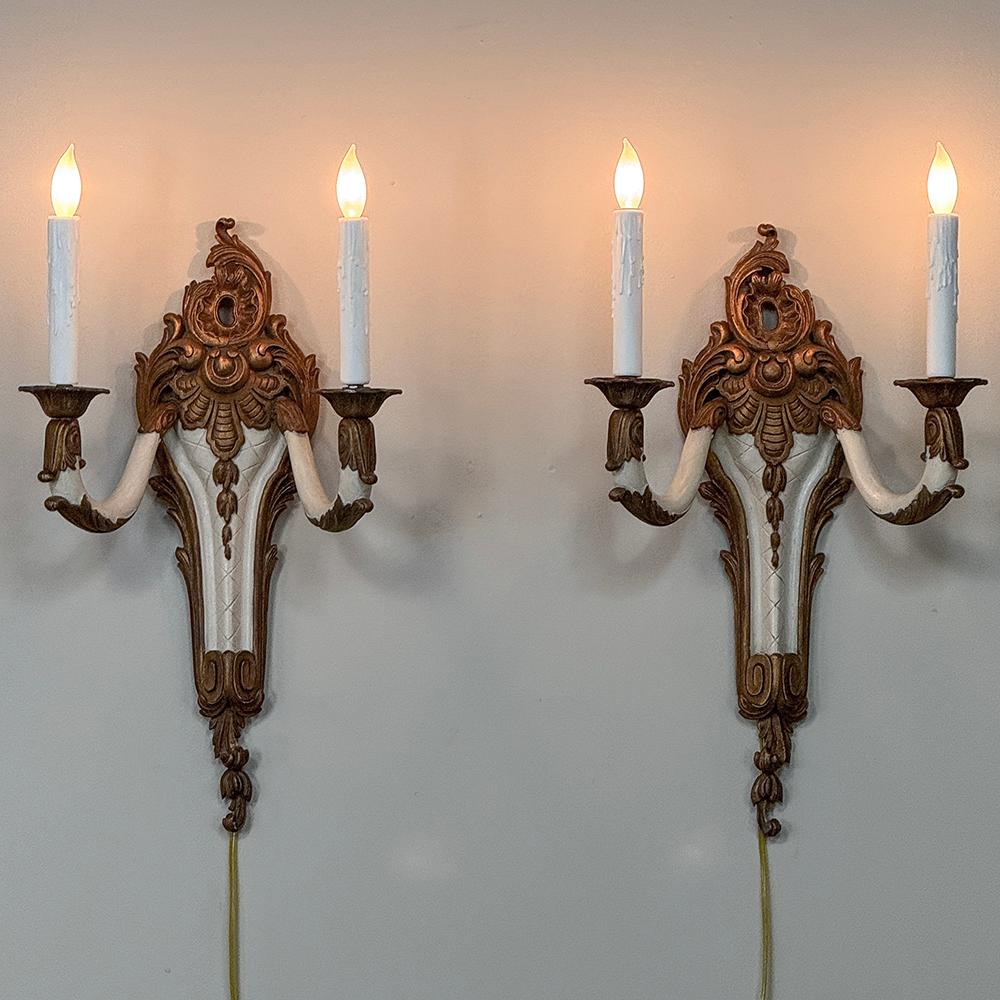 Pair Antique French Louis XV Painted Wall Sconces are the perfect choice to provide timeless elegance to any room!  Carved from solid wood by master sculptors, each features the classic asymmetrical rococo style shell on top, each 