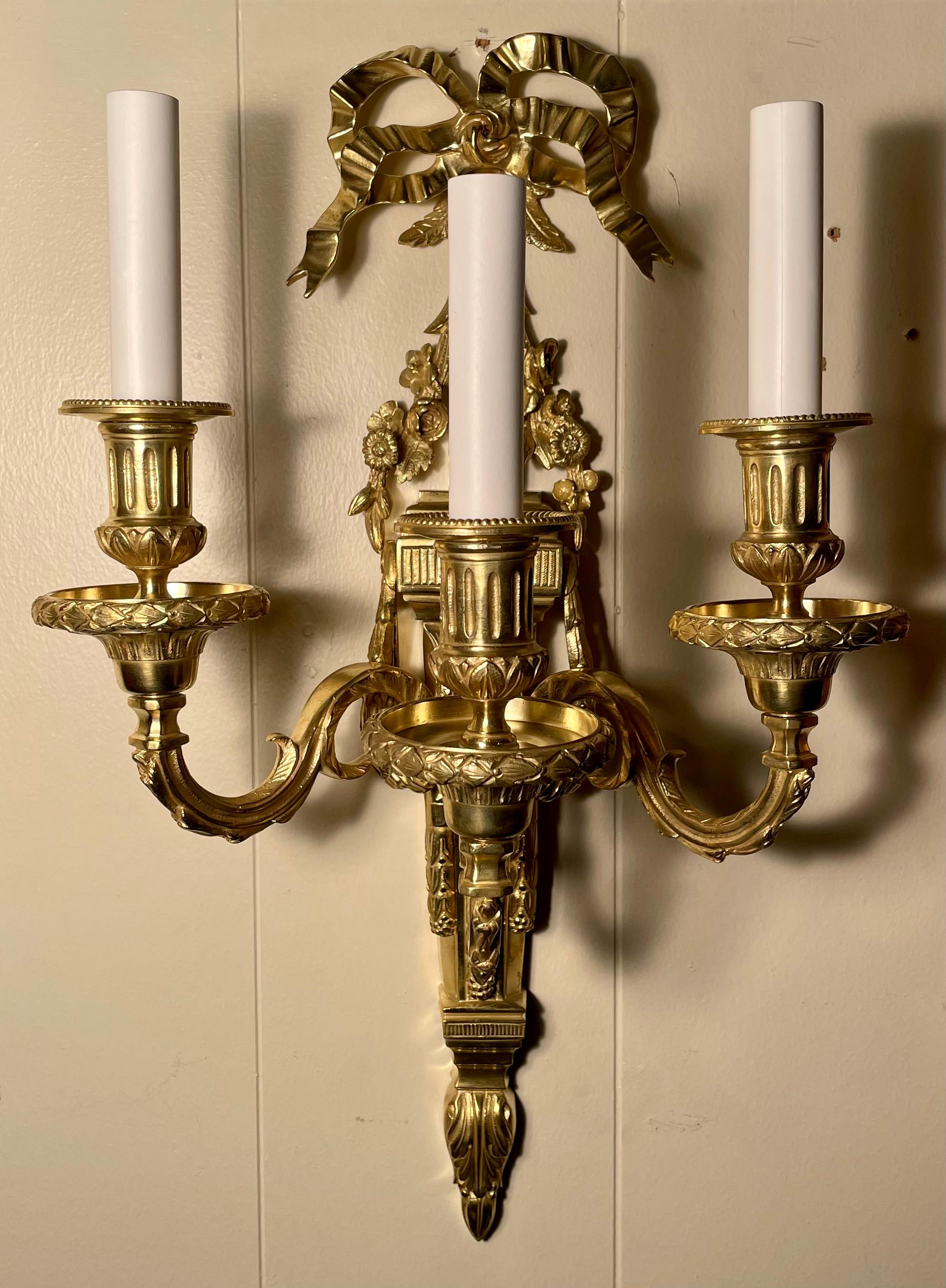 Pair antique French Louis XVI bronze sconces.