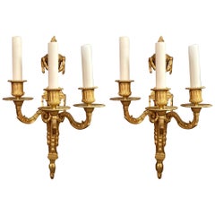 Coppia Antique French Louis XVI Gold Bronze Three Light Wall Sconces, Circa 1900.