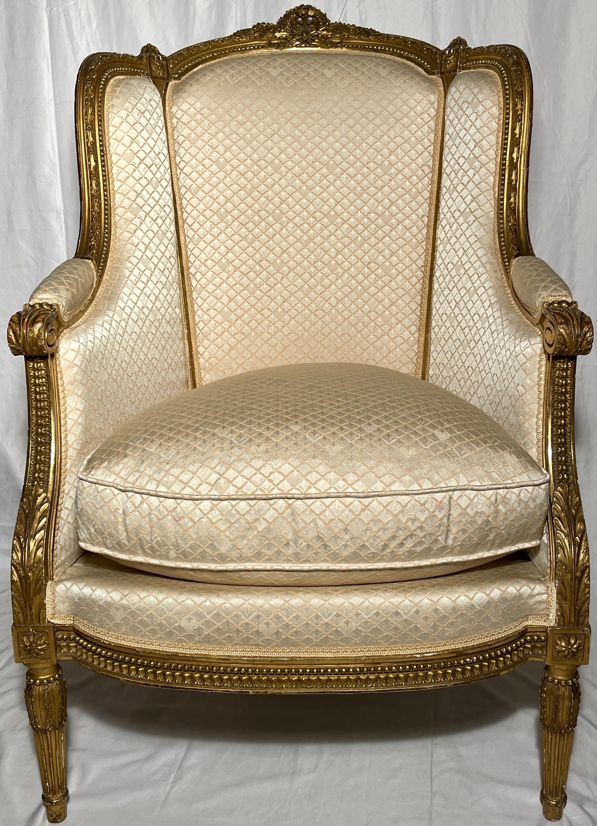 Pair antique French Louis XVI gold leaf fauteuils / armchairs, Circa 1865-1875.