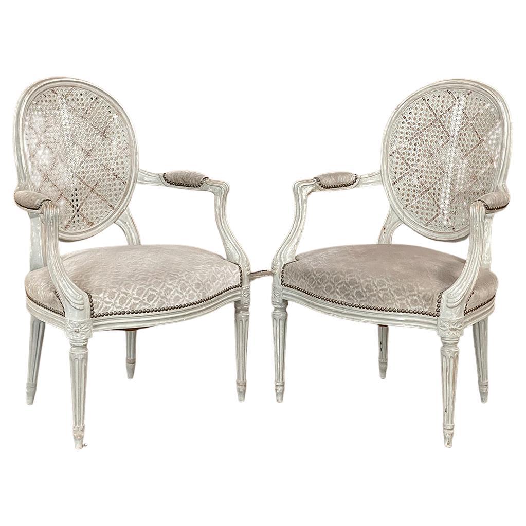 Pair Antique French Louis XVI Painted Armchairs with Cane and Fabric For Sale