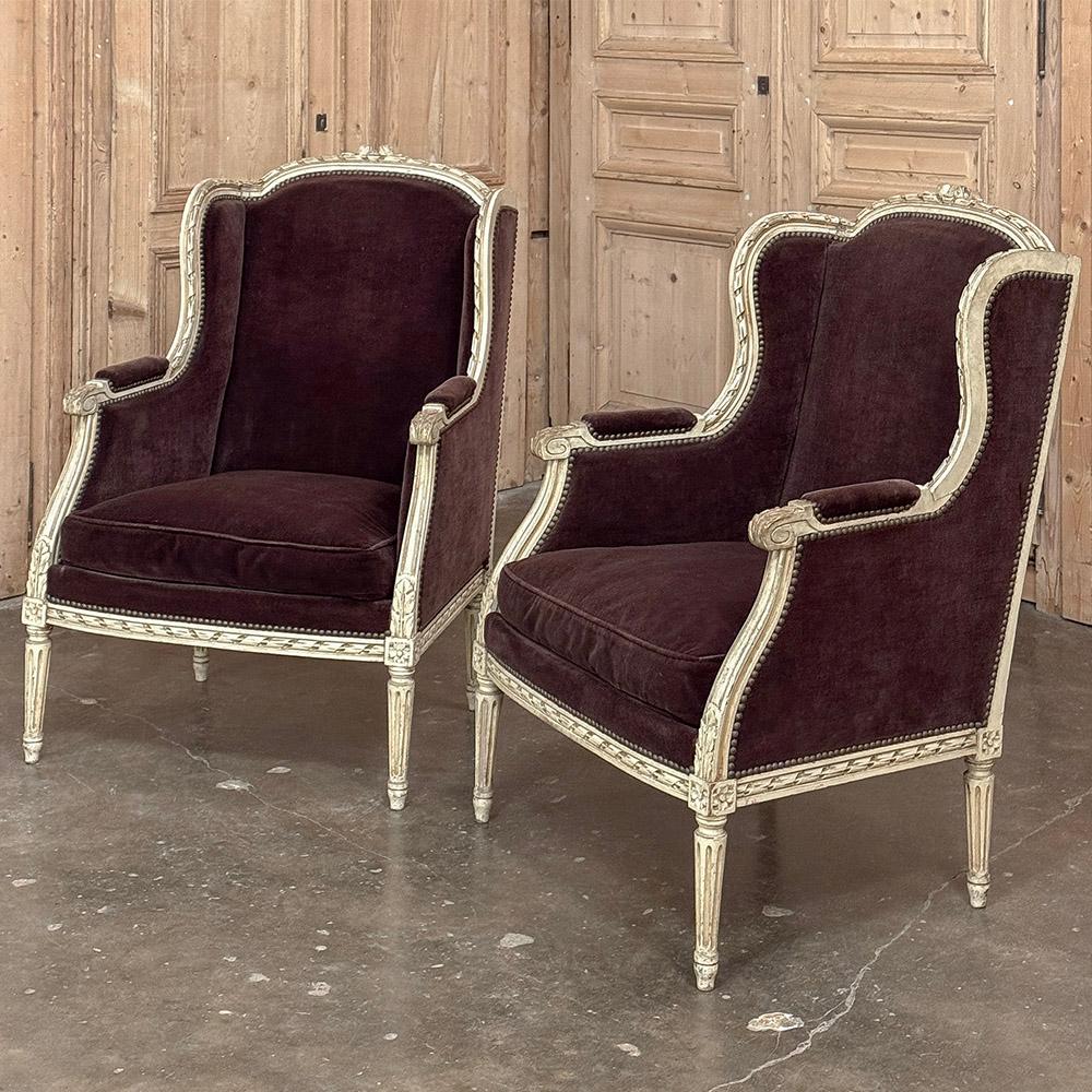 Pair Antique French Louis XVI Painted Bergeres ~ Armchairs are upholstered in luxurious mohair for long lasting beauty and comfort your family will enjoy for decades!  Hand-carved solid fruitwood frames include a subtly arched seat back crown
