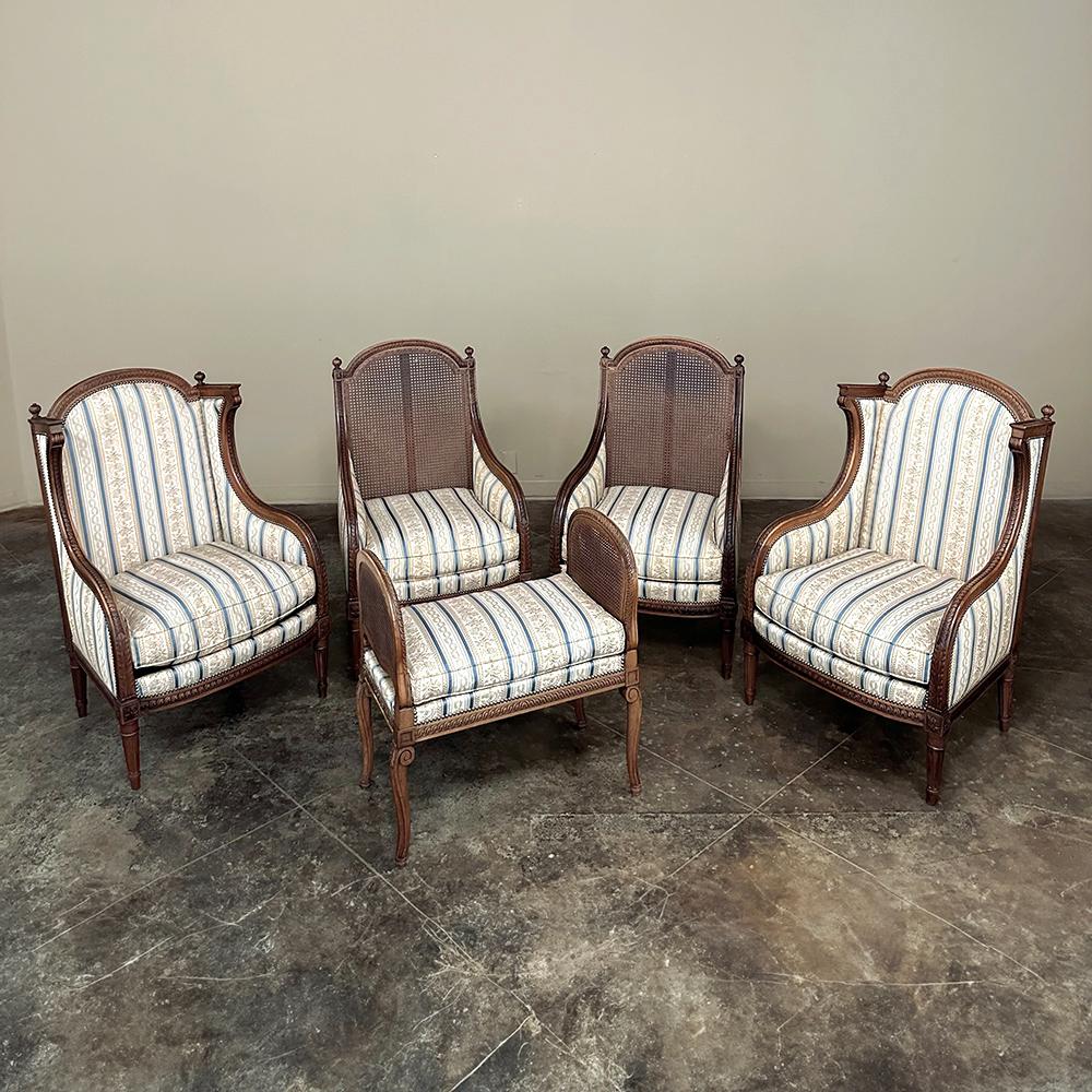 Pair Antique French Louis XVI Walnut Upholstered Bergeres ~ Armchairs is the perfect choice for comfortable seating in any room of the home or office.  The frames features bold classical contours inspired by the ancient Greek and Roman civilizations